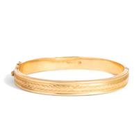 TWO YELLOW GOLD BANGLE BRACELETS
