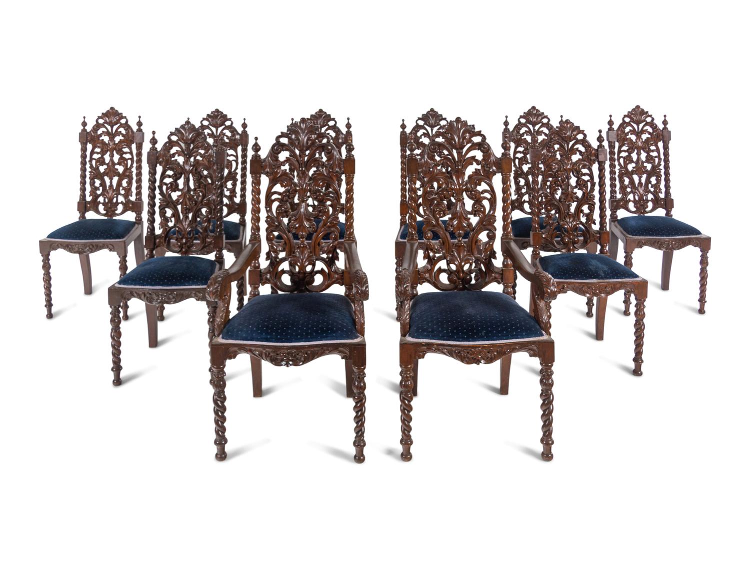 A Set of Ten Jacobean Style Carved Walnut Dining Chairs