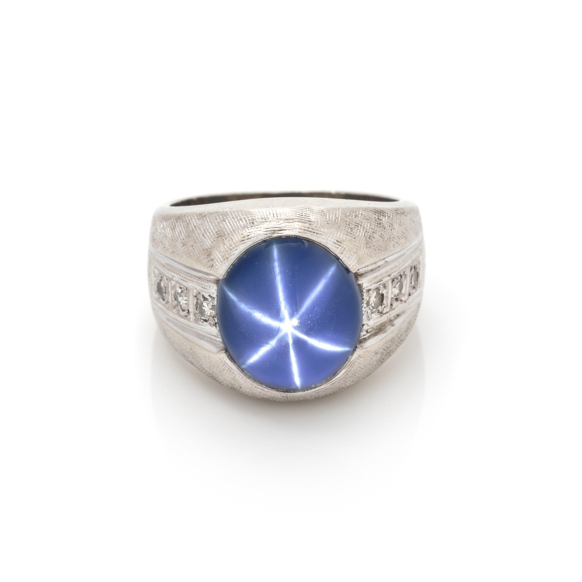 SYNTHETIC STAR SAPPHIRE AND DIAMOND RING