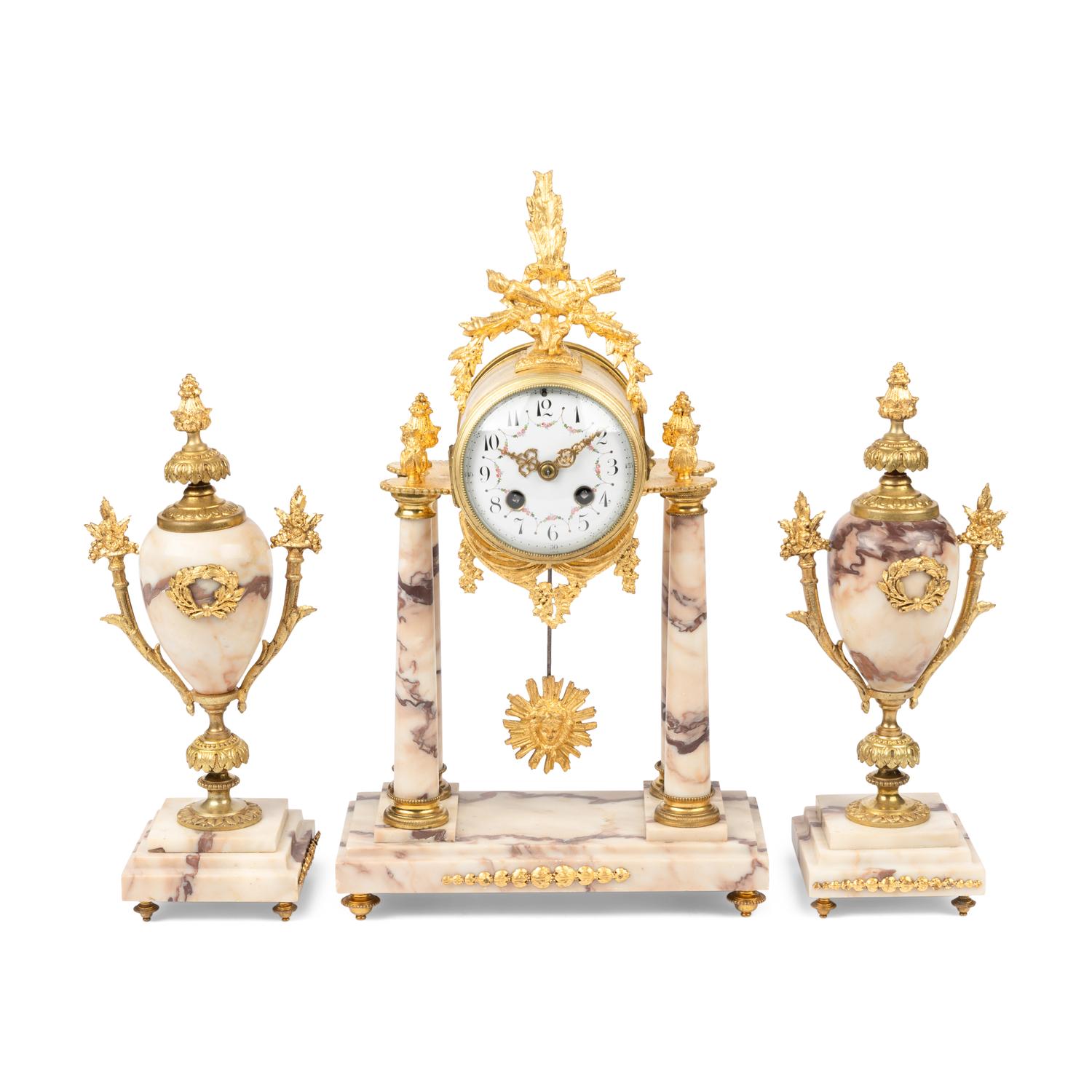 A French Gilt Bronze Mounted Marble Clock Garniture