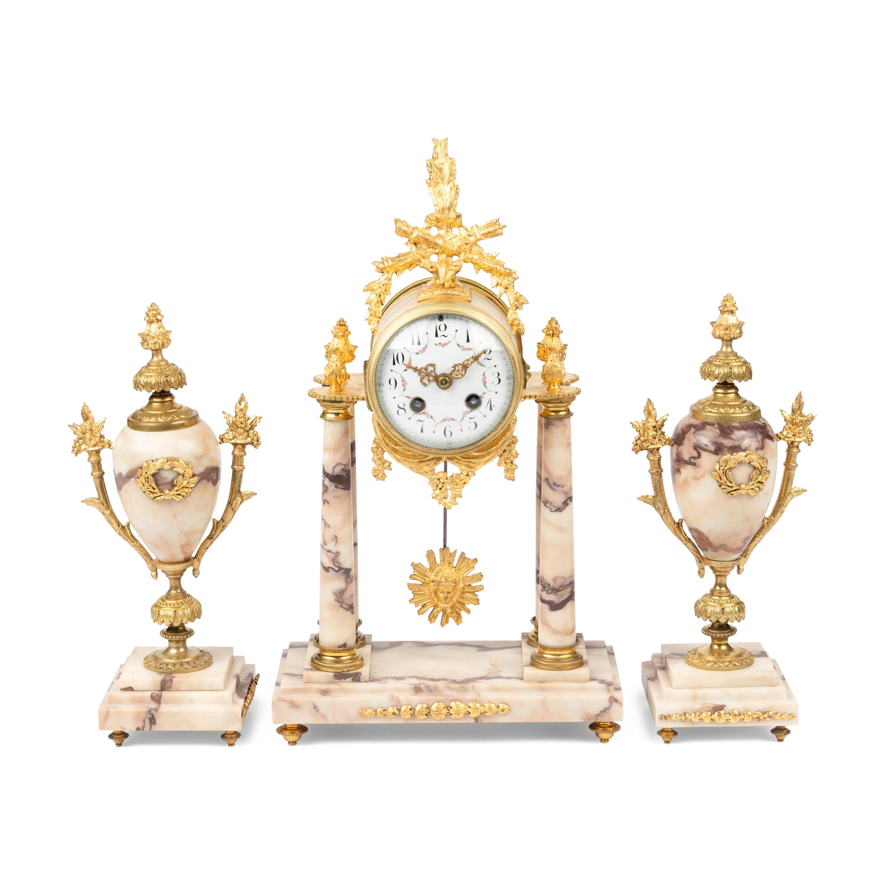 A French Gilt Bronze Mounted Marble Clock Garniture