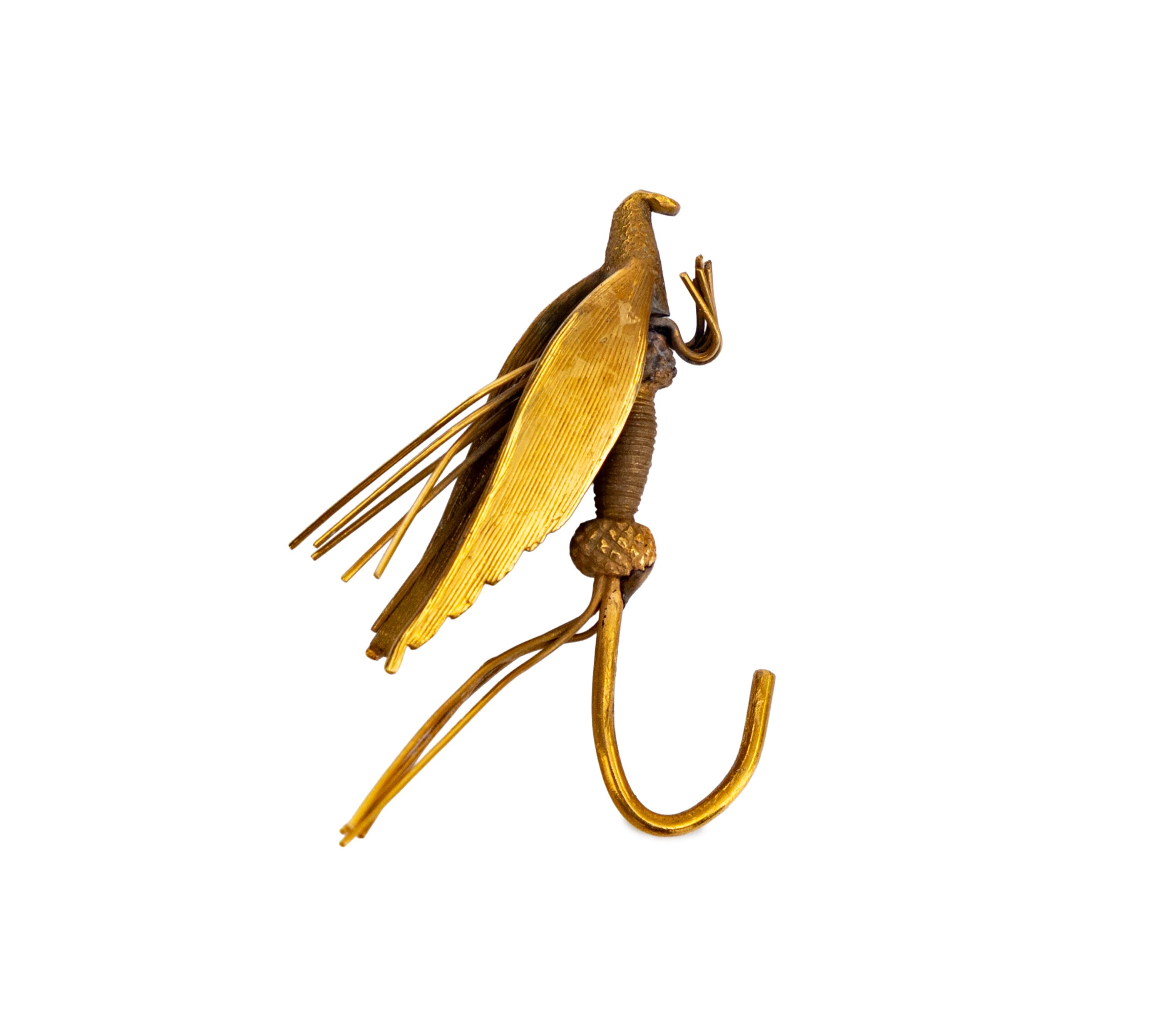 A Steuben Glass and 18 Karat Gold Trout And Fly Sculpture