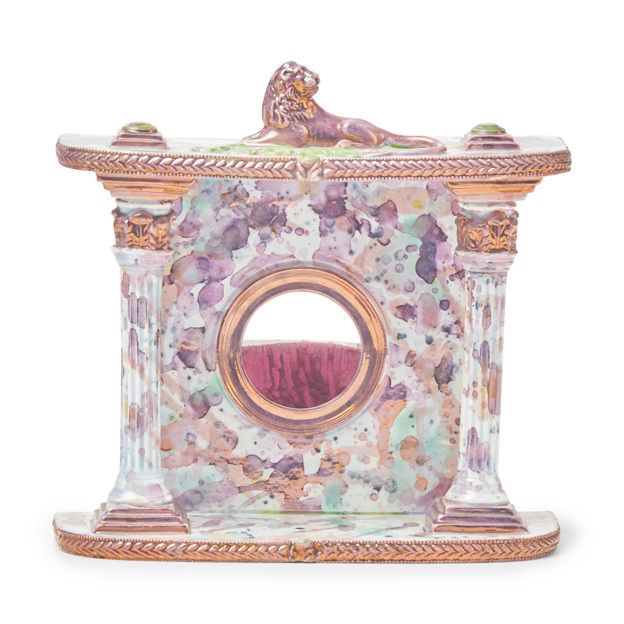 A Staffordshire Pink Sunderland Lustreware Watch Hutch