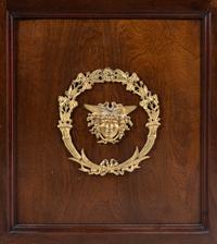 An Empire Style Gilt Metal Mounted Mahogany Bookcase