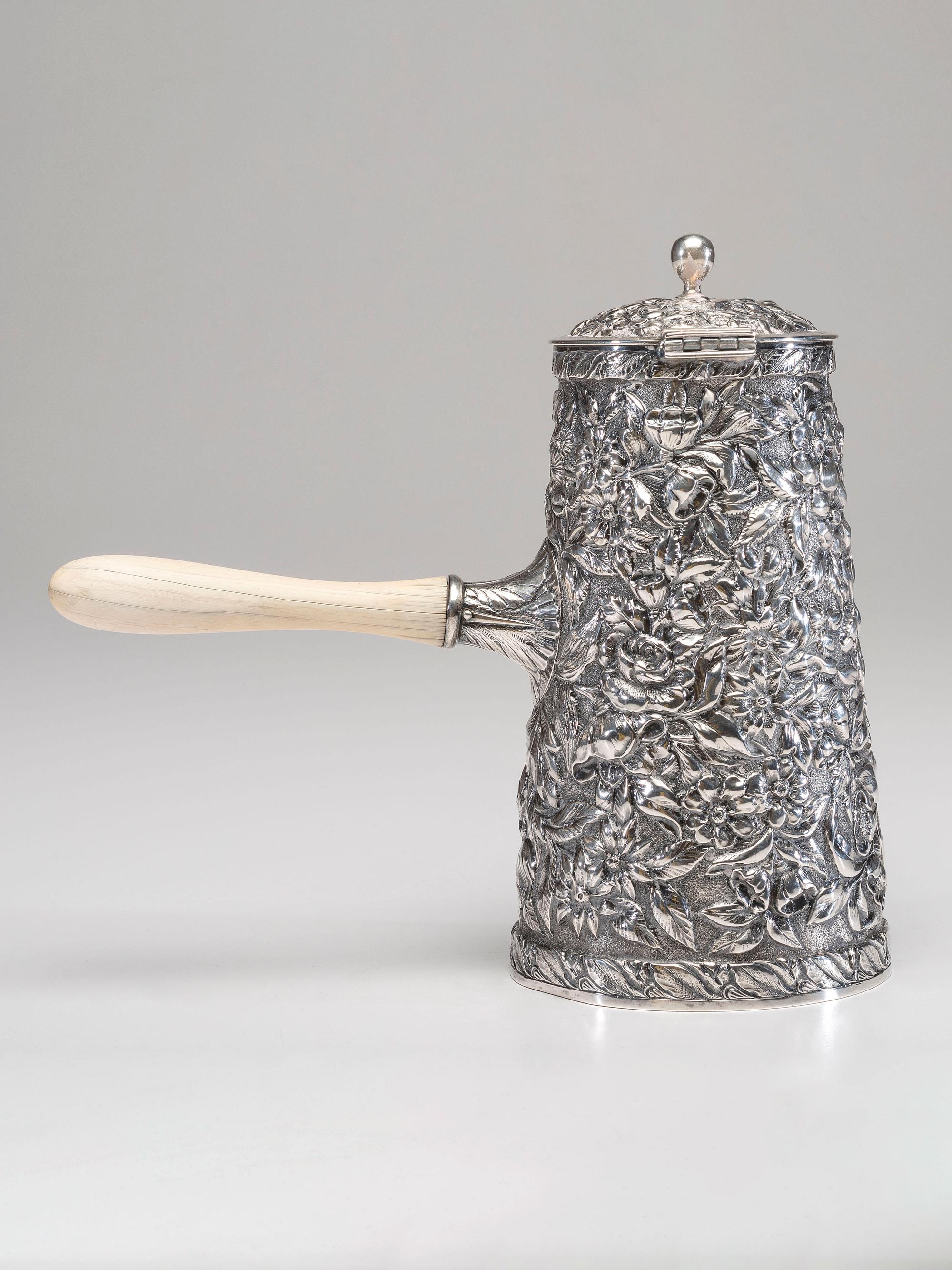 An American Silver Repoussé Chocolate Pot