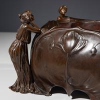 An Art Nouveau Figural Footed Jardinière