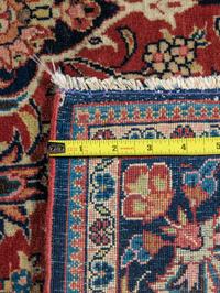 A Kashan Wool Rug