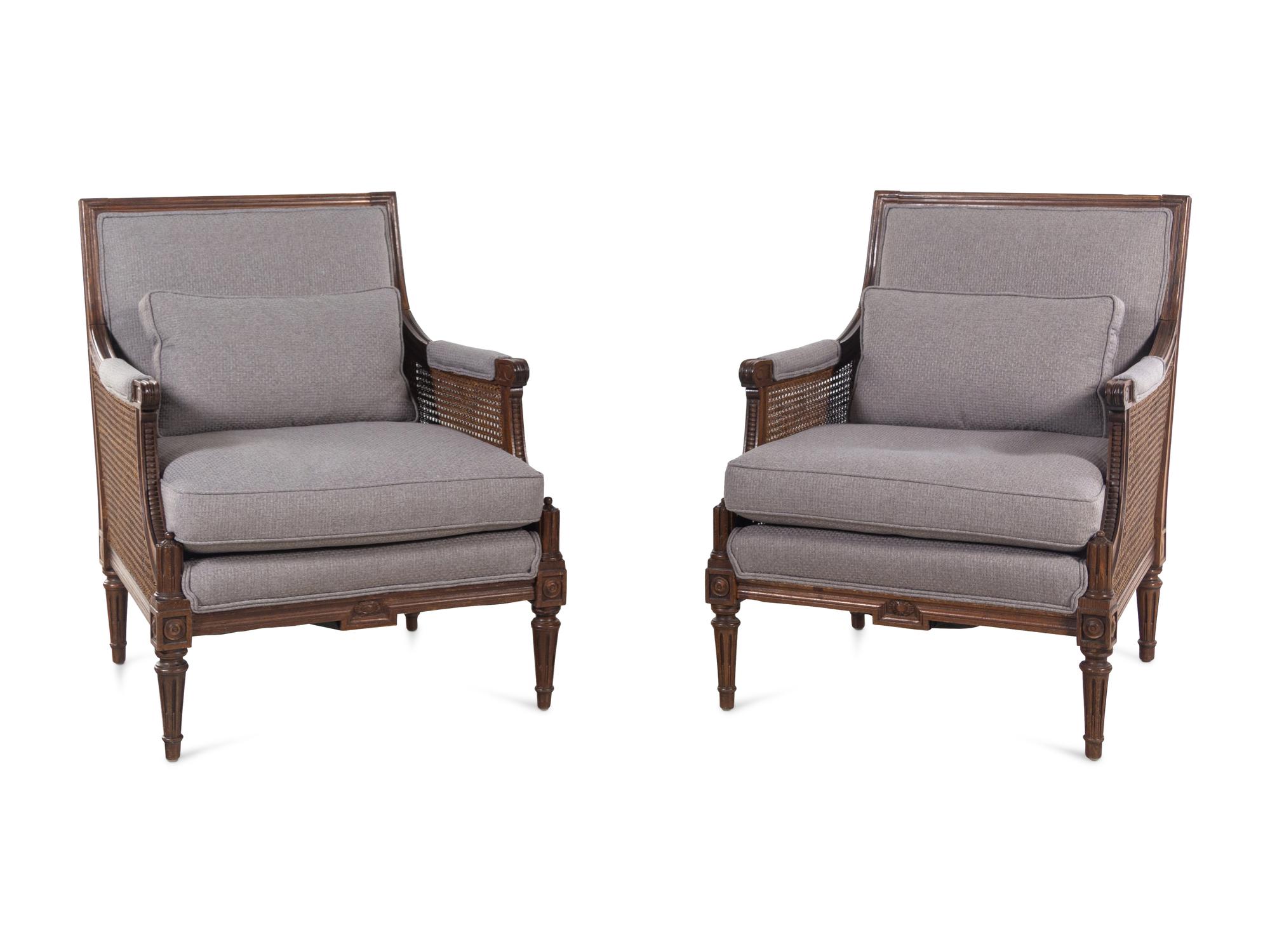 A Pair of Louis XVI Style Walnut Armchairs with Flannel Upholstery