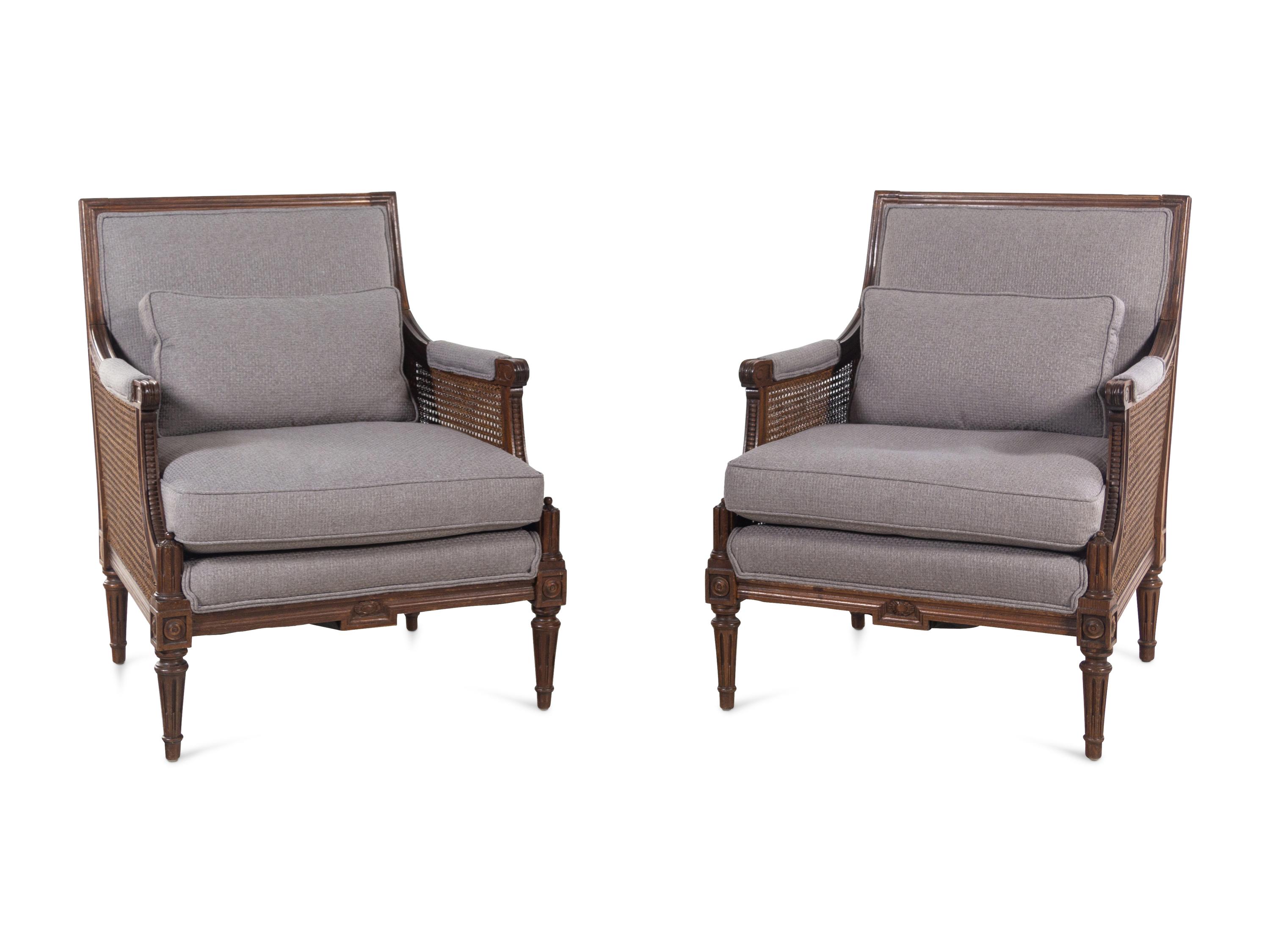A Pair of Louis XVI Style Walnut Armchairs with Flannel Upholstery