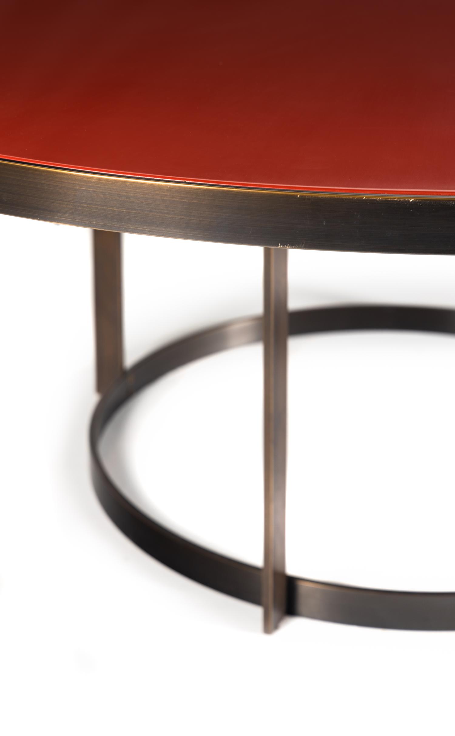 A Custom Bronze and Red Lacquer Dining Table