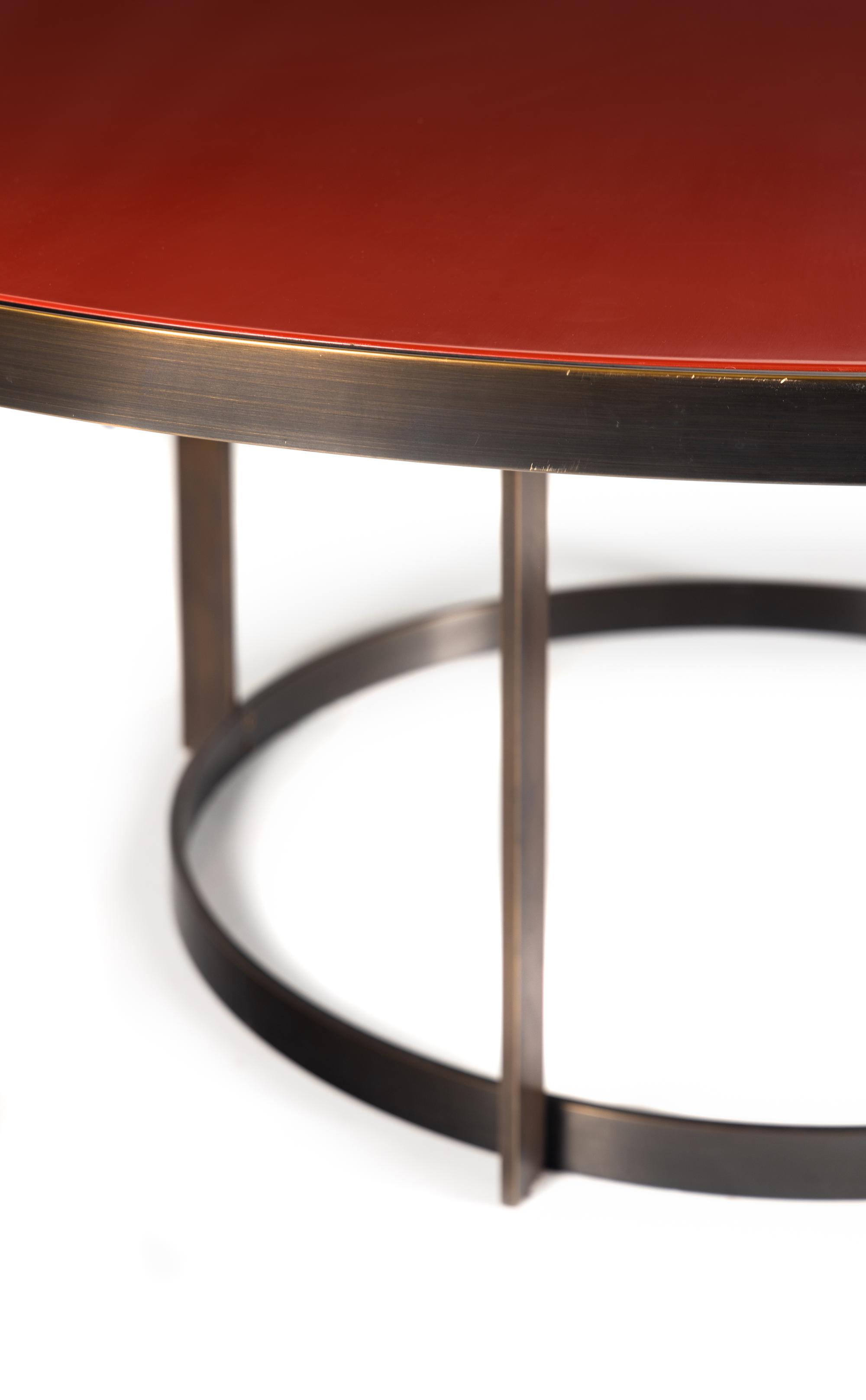 A Custom Bronze and Red Lacquer Dining Table
