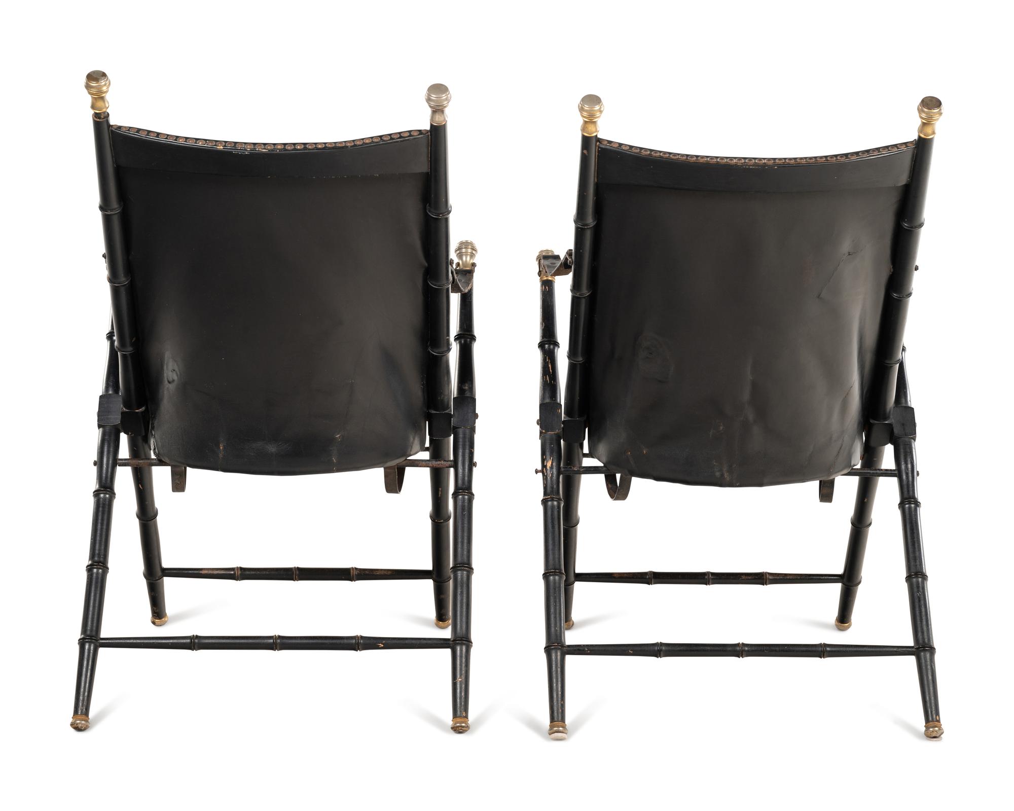 A Pair of Spanish Leather-Upholstered Campaign Folding Chairs by Valenti