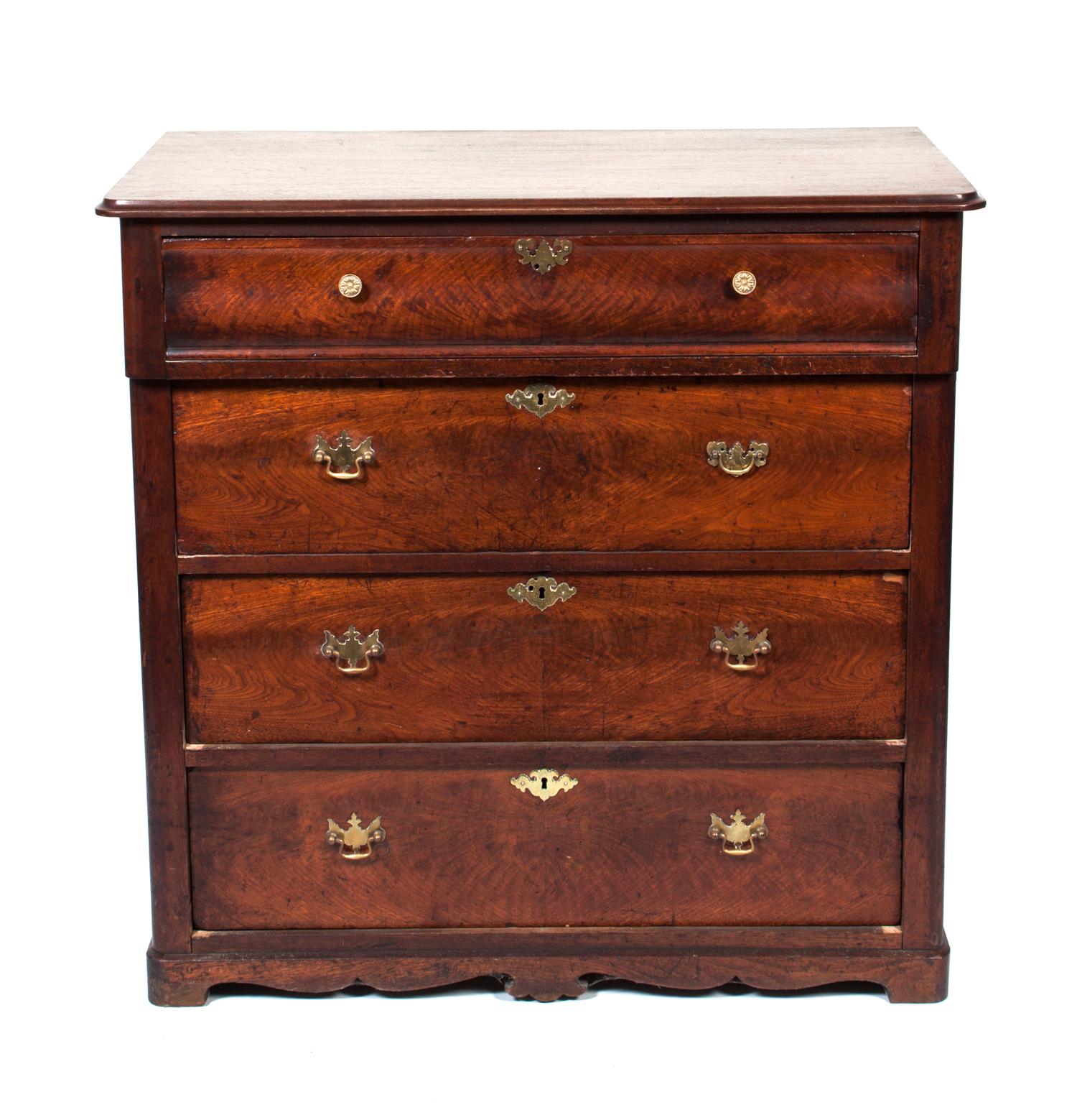 An Oak Chest of Drawers Height 39 x width 39 1/2 x depth 22 inches.