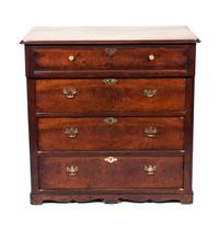 An Oak Chest of Drawers Height 39 x width 39 1/2 x depth 22 inches.