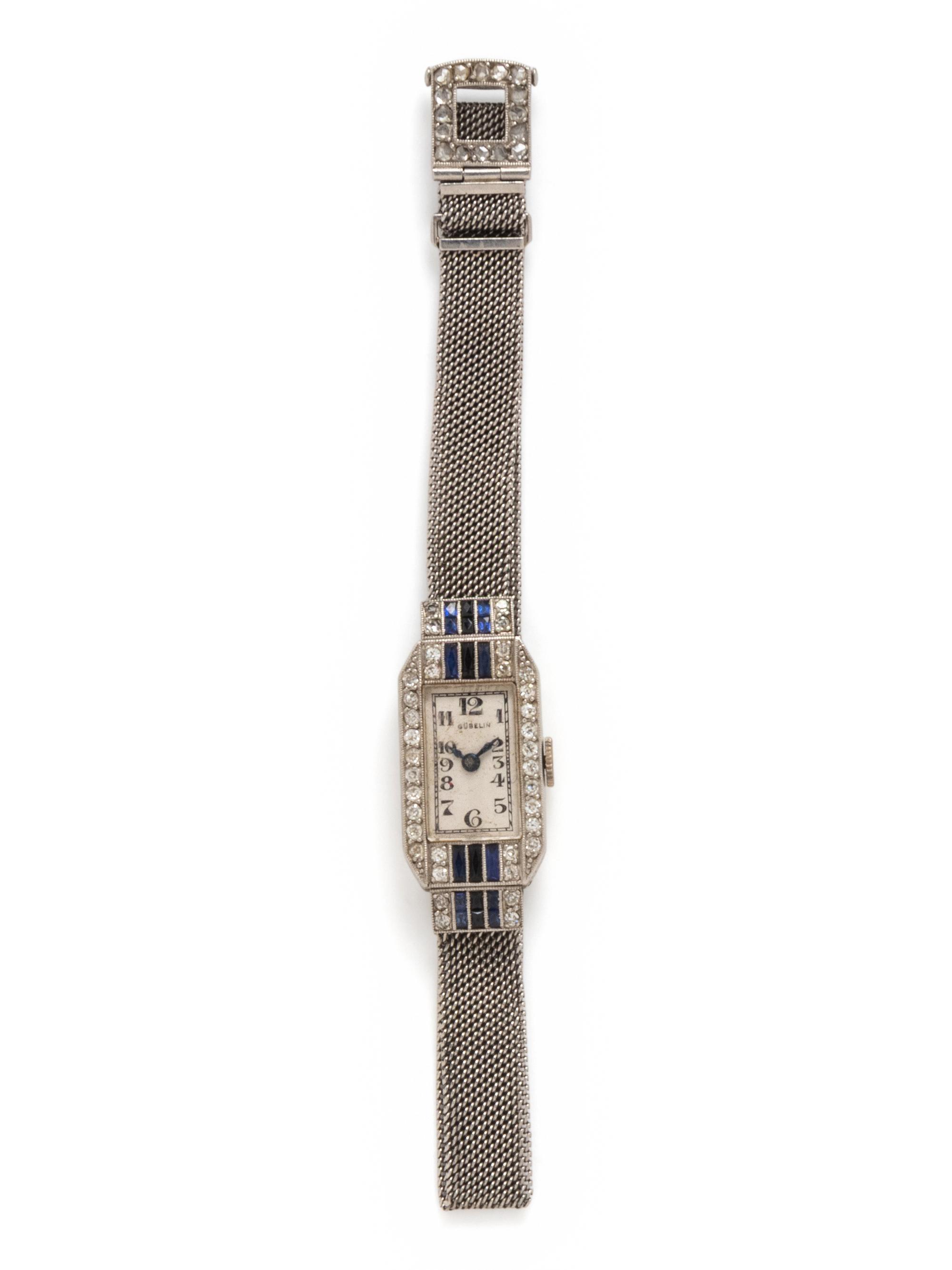 GÜBELIN, PLATINUM, DIAMOND, SYNTHETIC SAPPHIRE AND BLACK ONYX WATCH