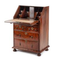 A Queen Anne Walnut Diminutive Slant-Front Desk Height 37 1/2 x width 26 x depth 18 1/4 inches. — 18TH CENTURY