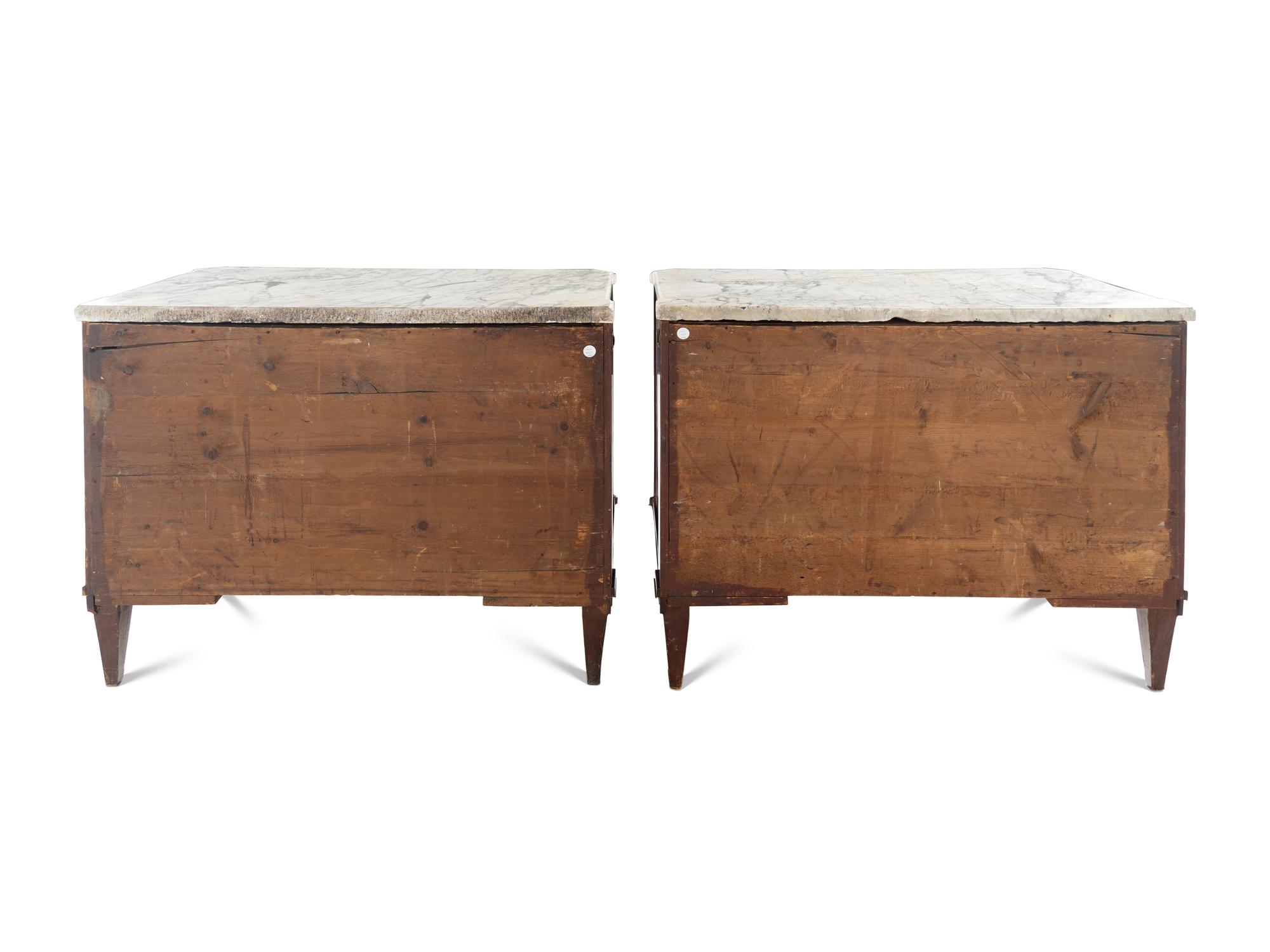 A Pair of Swedish Neoclassical Gilt Metal Mounted Mahogany Marble-Top Commodes