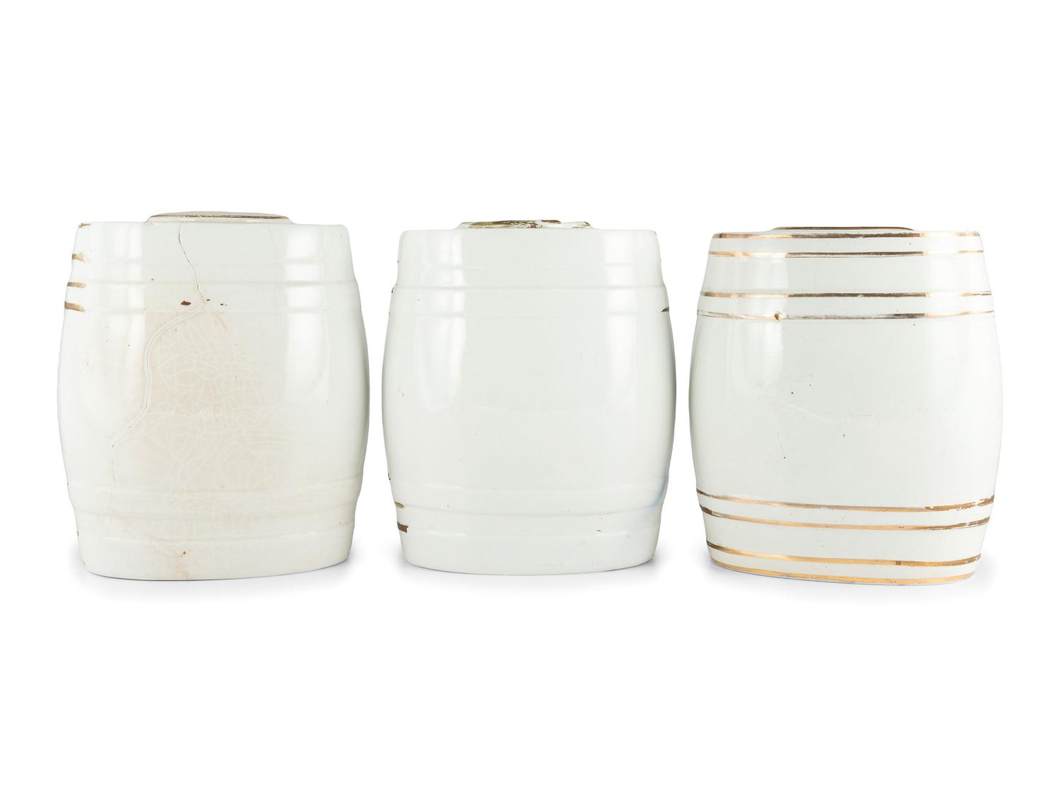 Three English Parcel-Gilt Porcelain Counter Top Liquor Dispensers