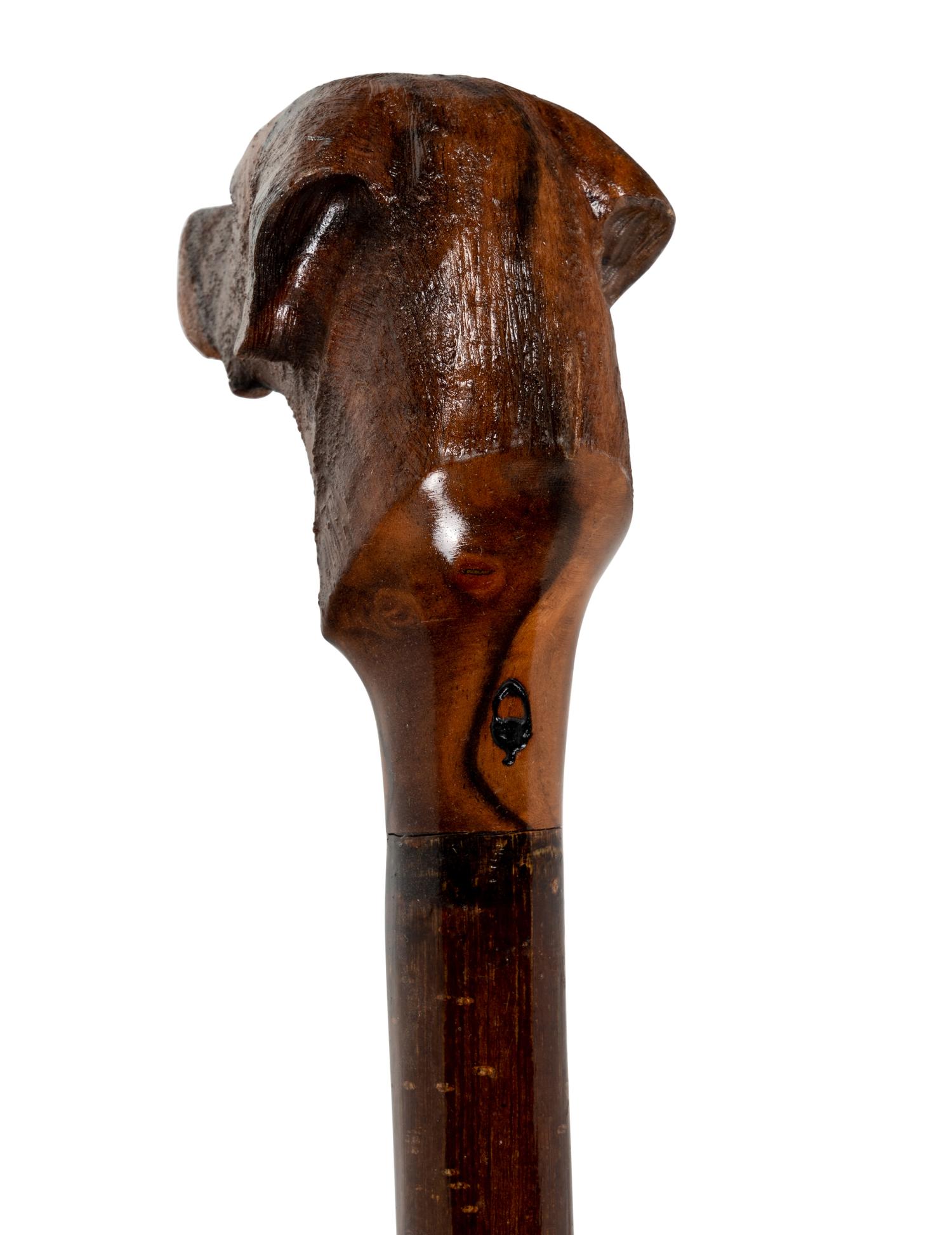 Two Figural Walking Sticks or Canes