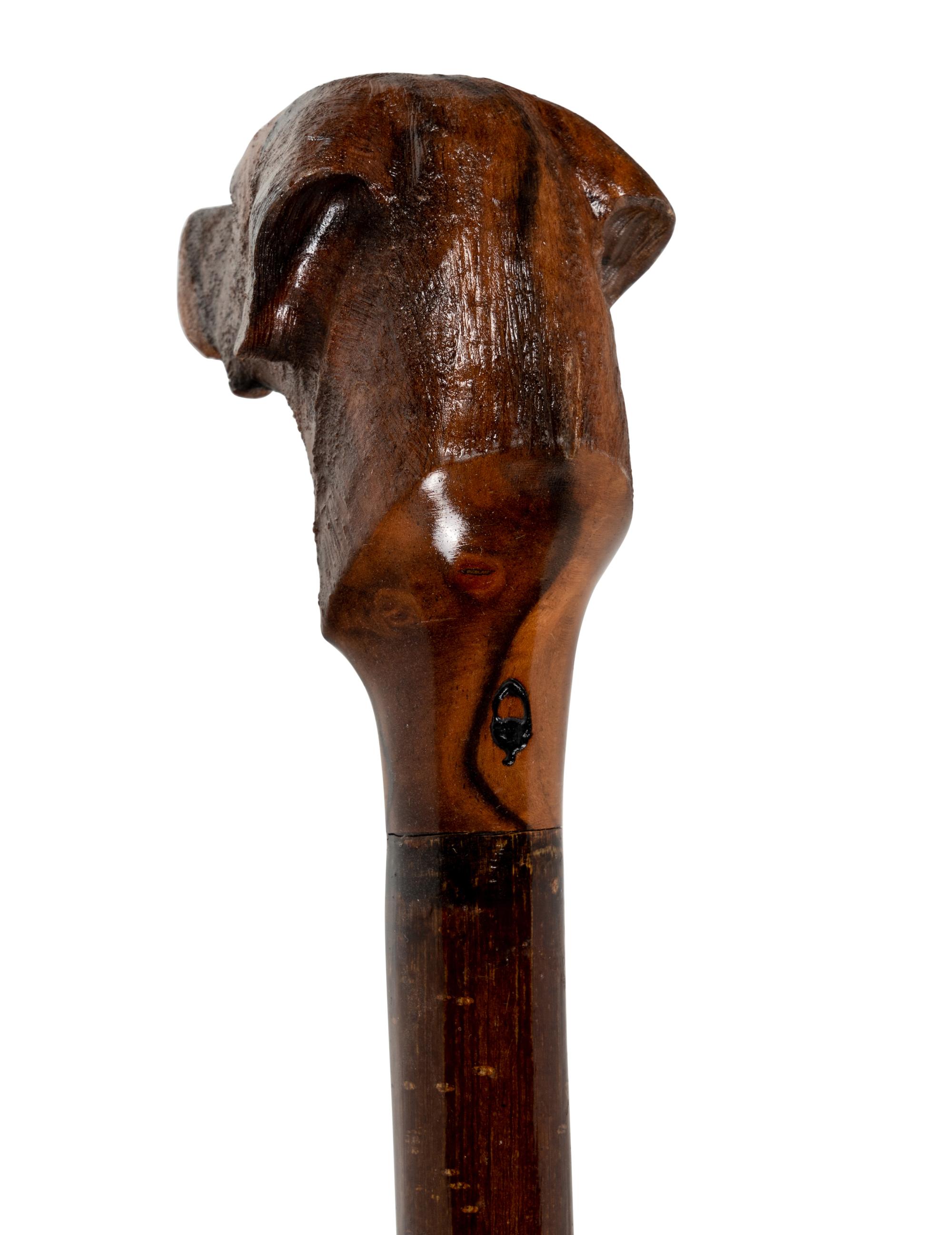 Two Figural Walking Sticks or Canes