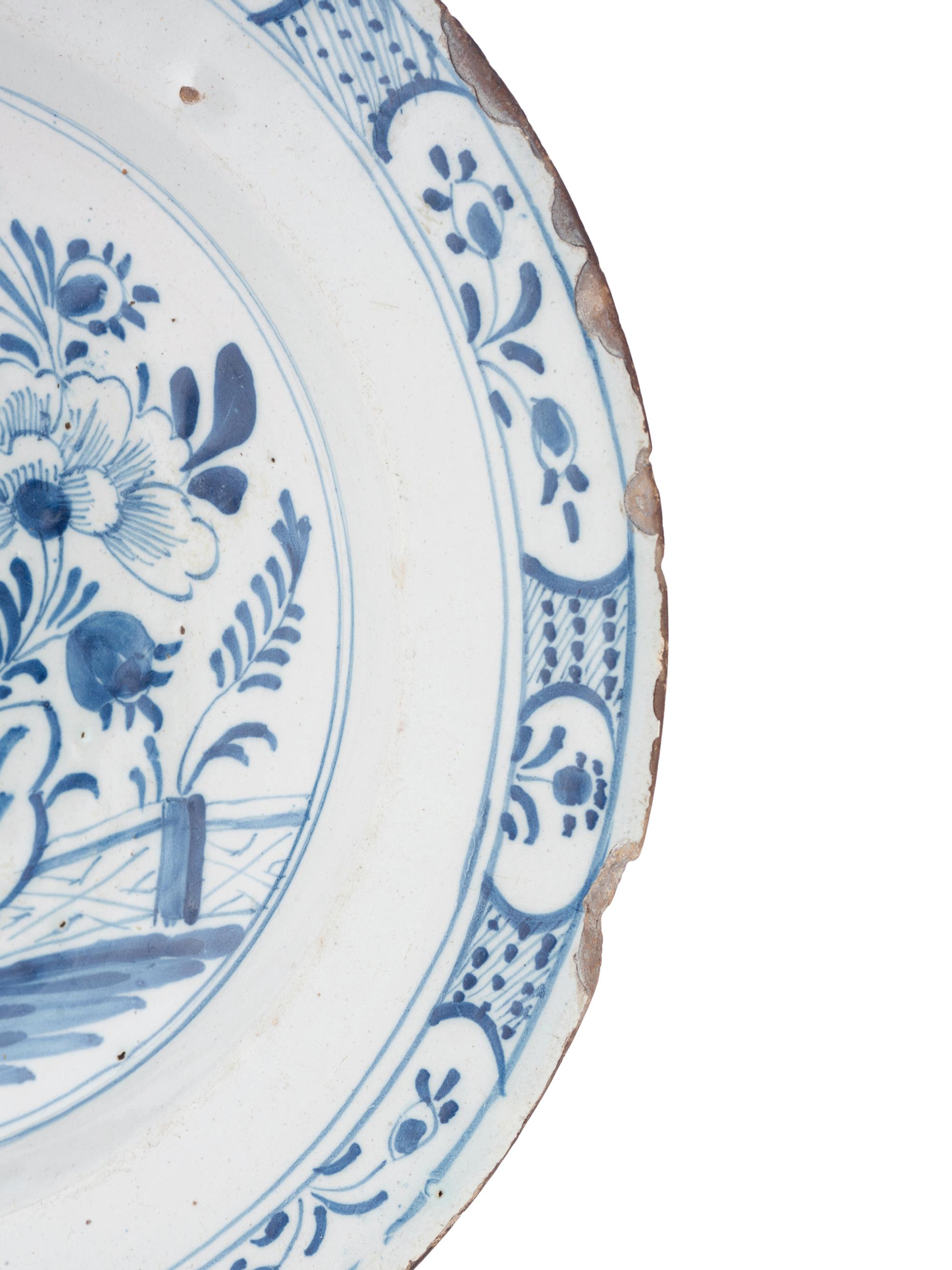 A Dutch Blue and White Glazed Delftware Charger