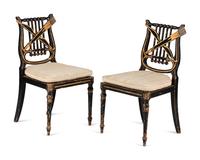 A Pair of Classical Gilt and Black Painted Lyre-Back Cane Upholstered Side Chairs