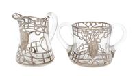 A Silver Overlay Glass Creamer and Sugar Set Height of creamer 4 1/8 inches.