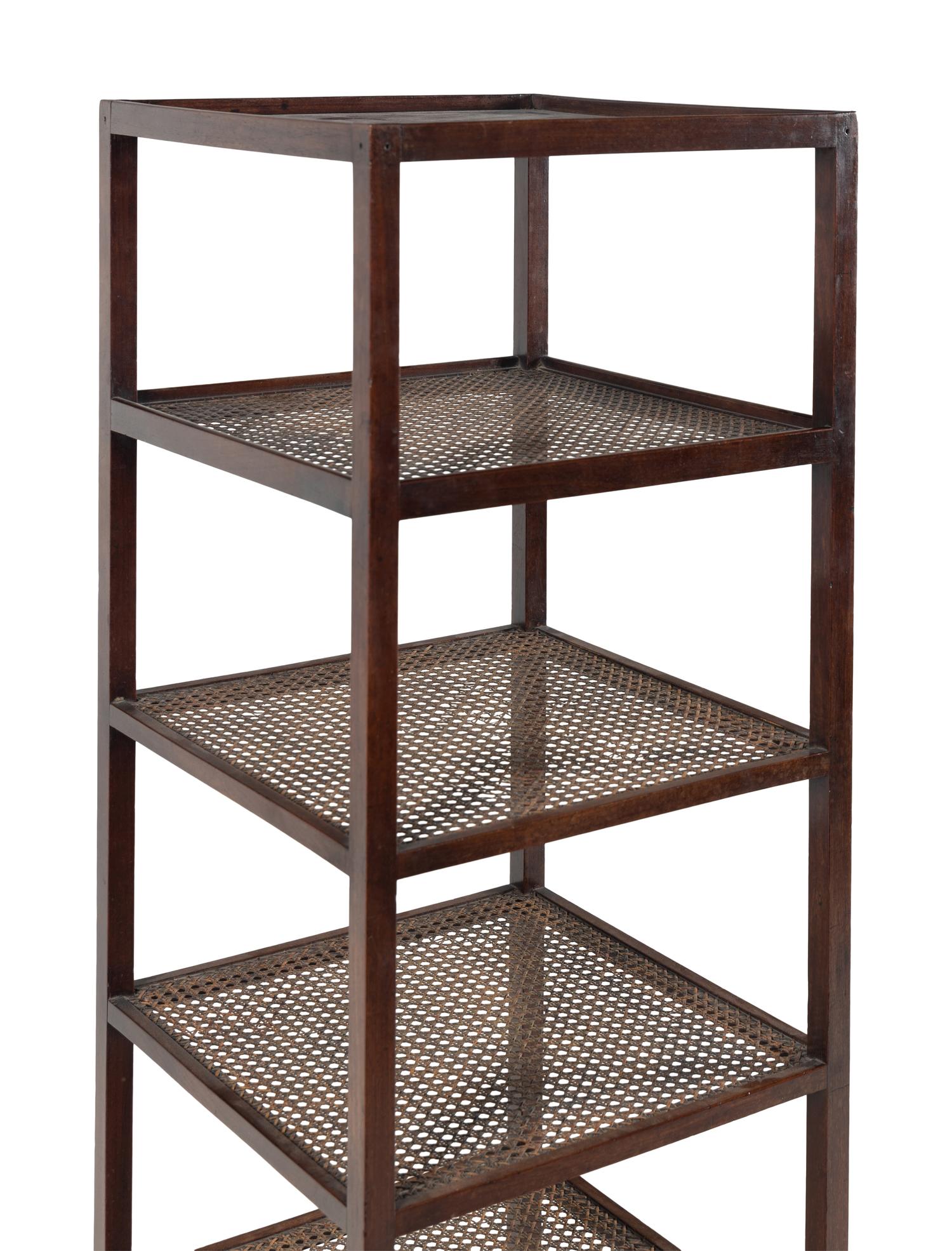 An Anglo-Indian Caned Padouk Six-Tier Étagère