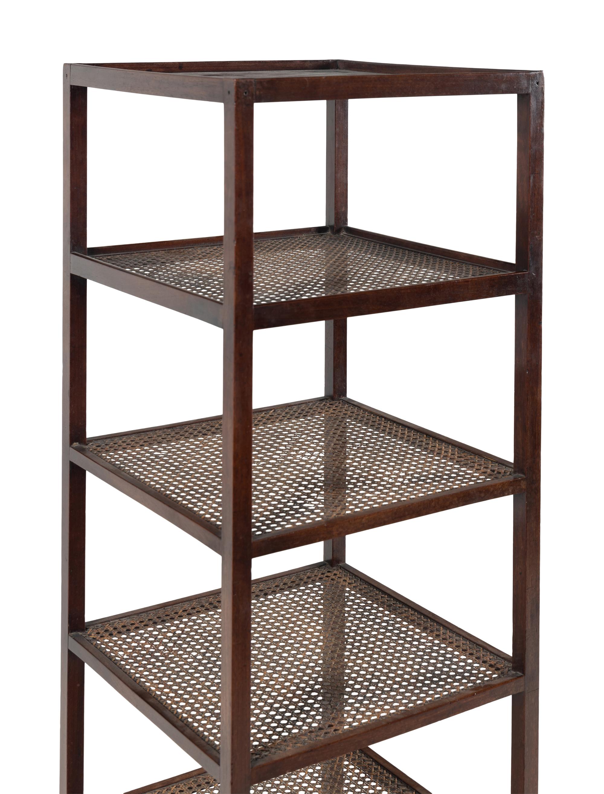 An Anglo-Indian Caned Padouk Six-Tier Étagère