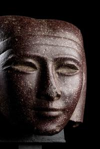 A Roman Porphyry Head of an Egyptian Woman