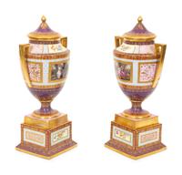 A Pair of Vienna Porcelain Urns and Covers