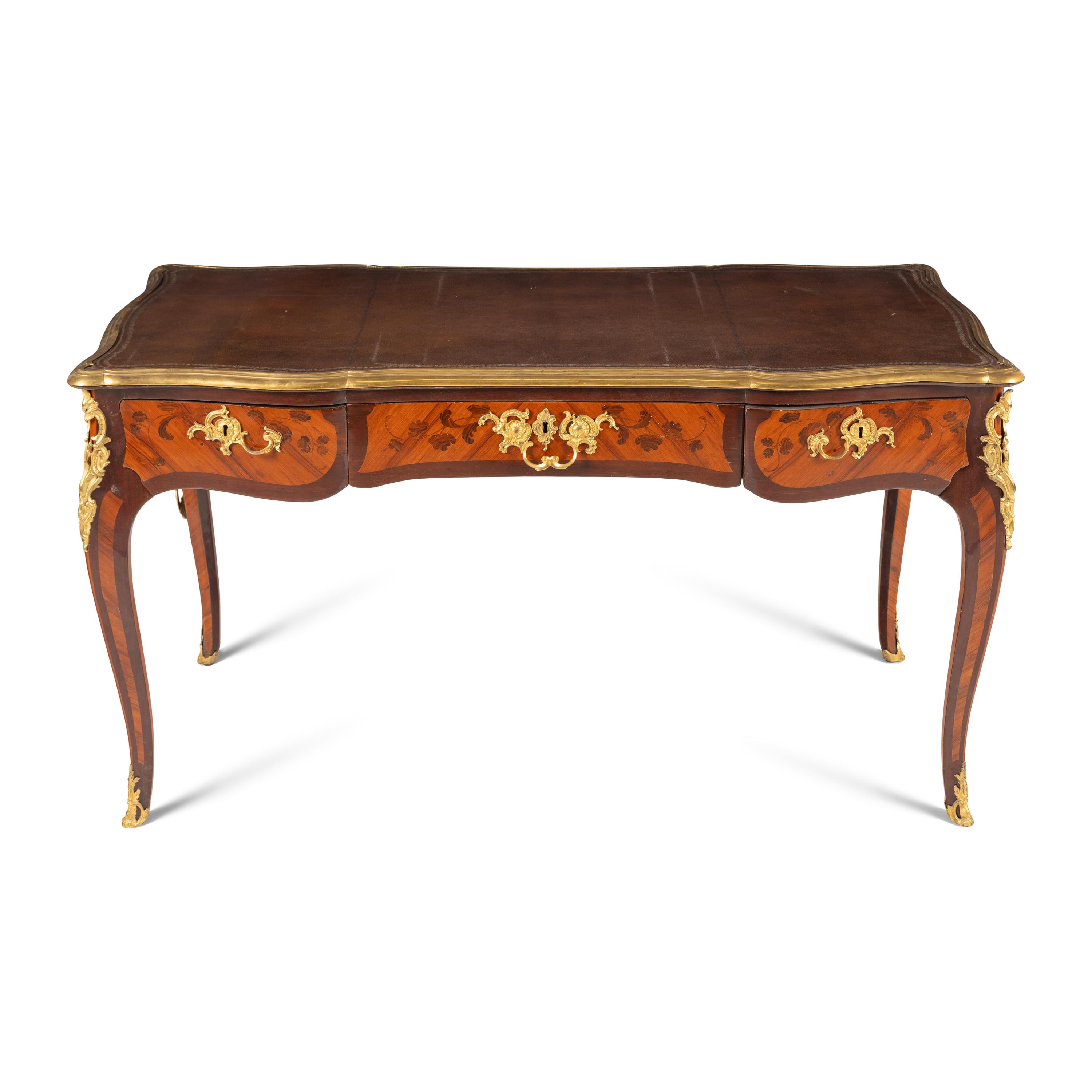 A Louis XV Gilt Bronze Mounted Tulipwood, Amaranth and Bois De Bout Marquetry Bureau Plat