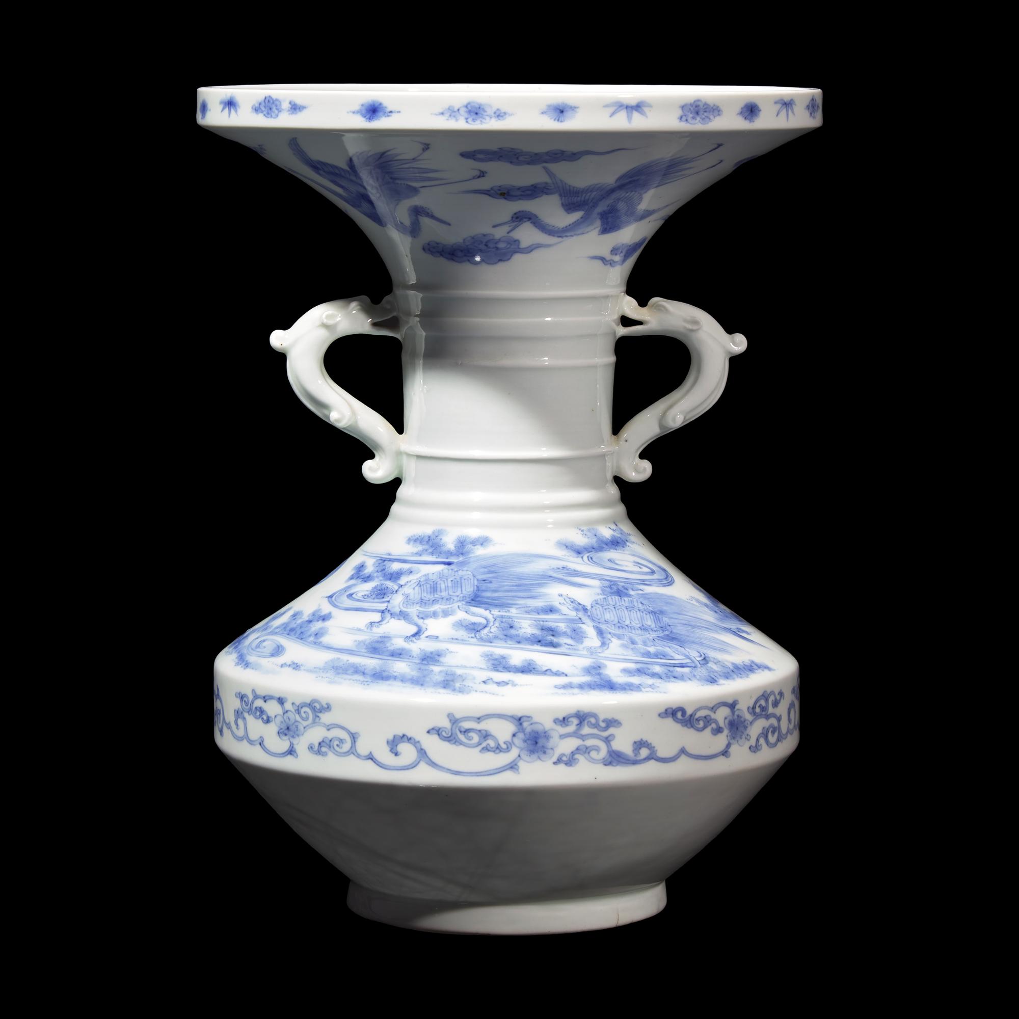 A Japanese Hirado Cranes and Minogame Vase with 'Dragon' Handles, Meiji Period 日本明治时代 平戶燒神龜紋雙龍首盤口瓶