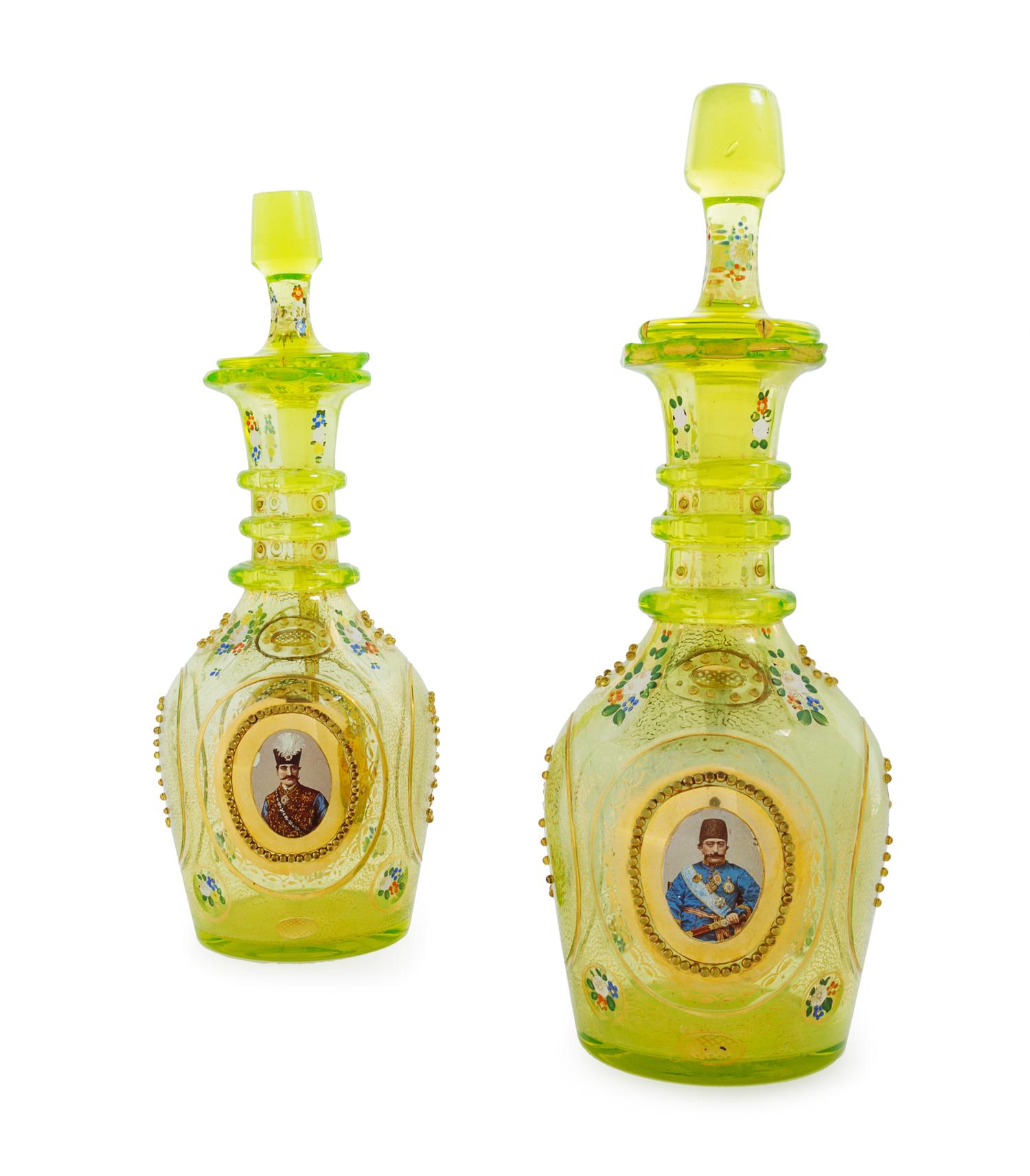 A Pair of Bohemian Enameled Glass Persian Market Decanters