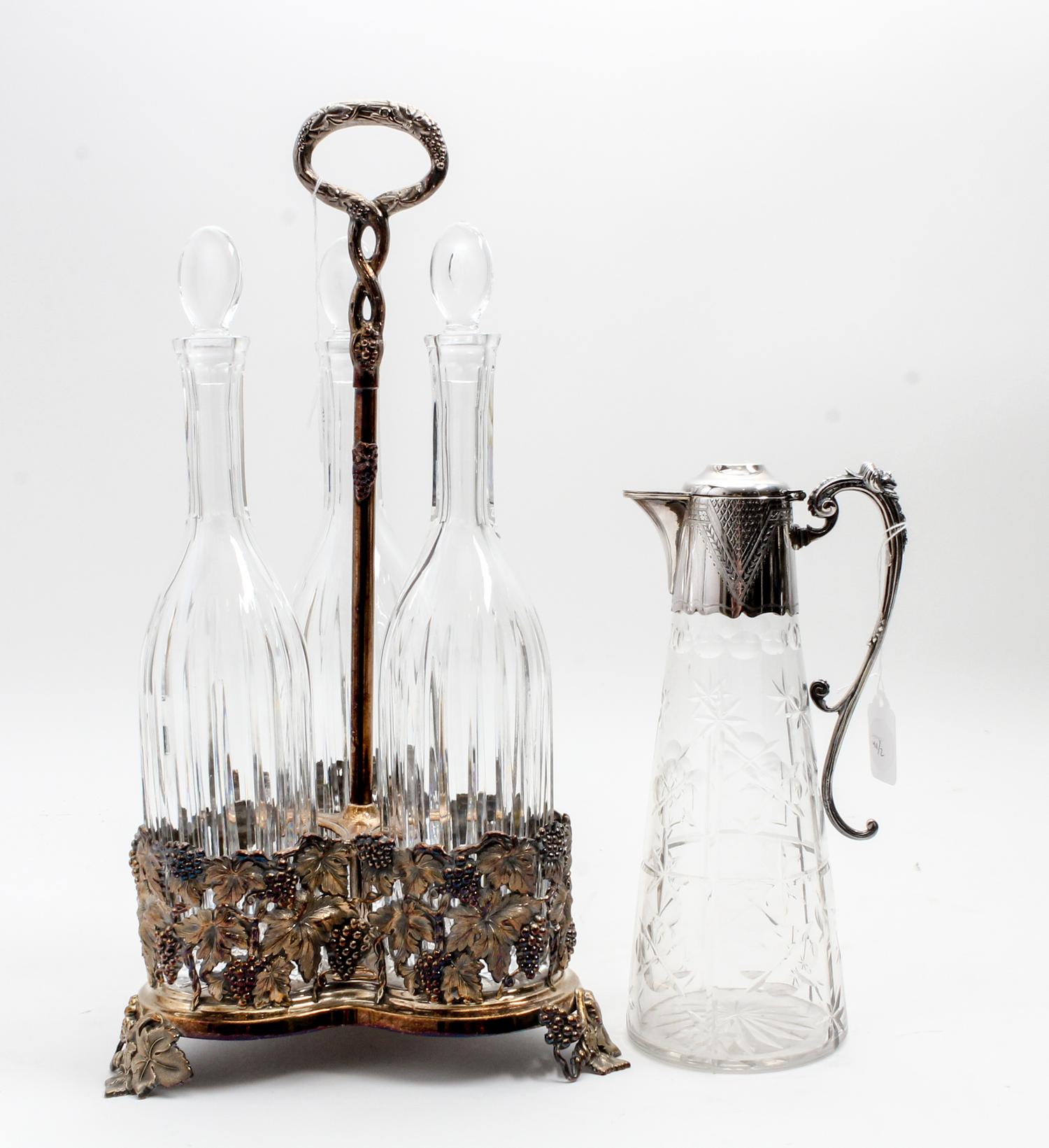 A Silver-Plate and Glass Decanter Set Height overall 17 3/4 inches. — 20TH CENTURY