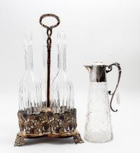 A Silver-Plate and Glass Decanter Set Height overall 17 3/4 inches. — 20TH CENTURY
