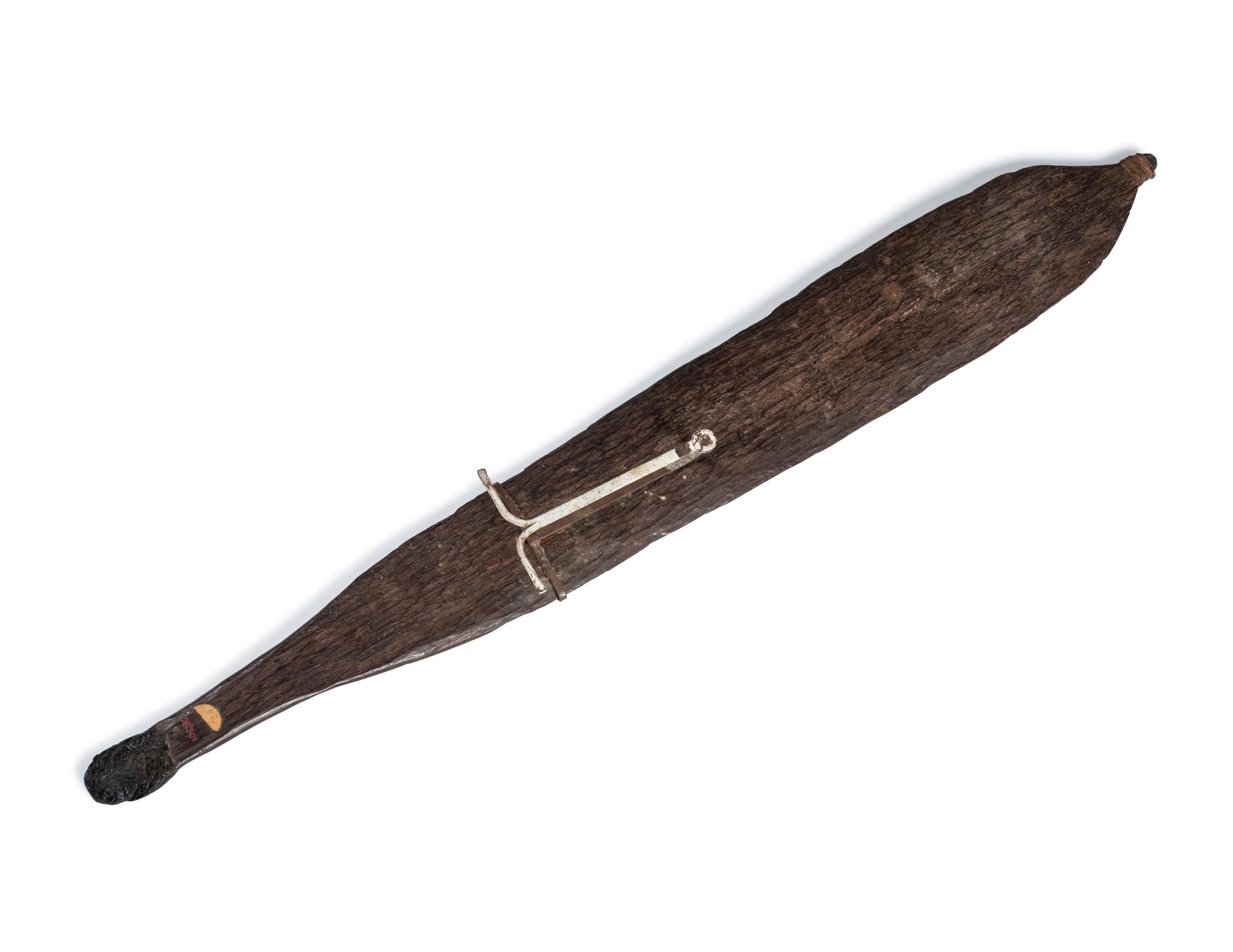 An Aboriginal Wood Spear Thrower (woomera)