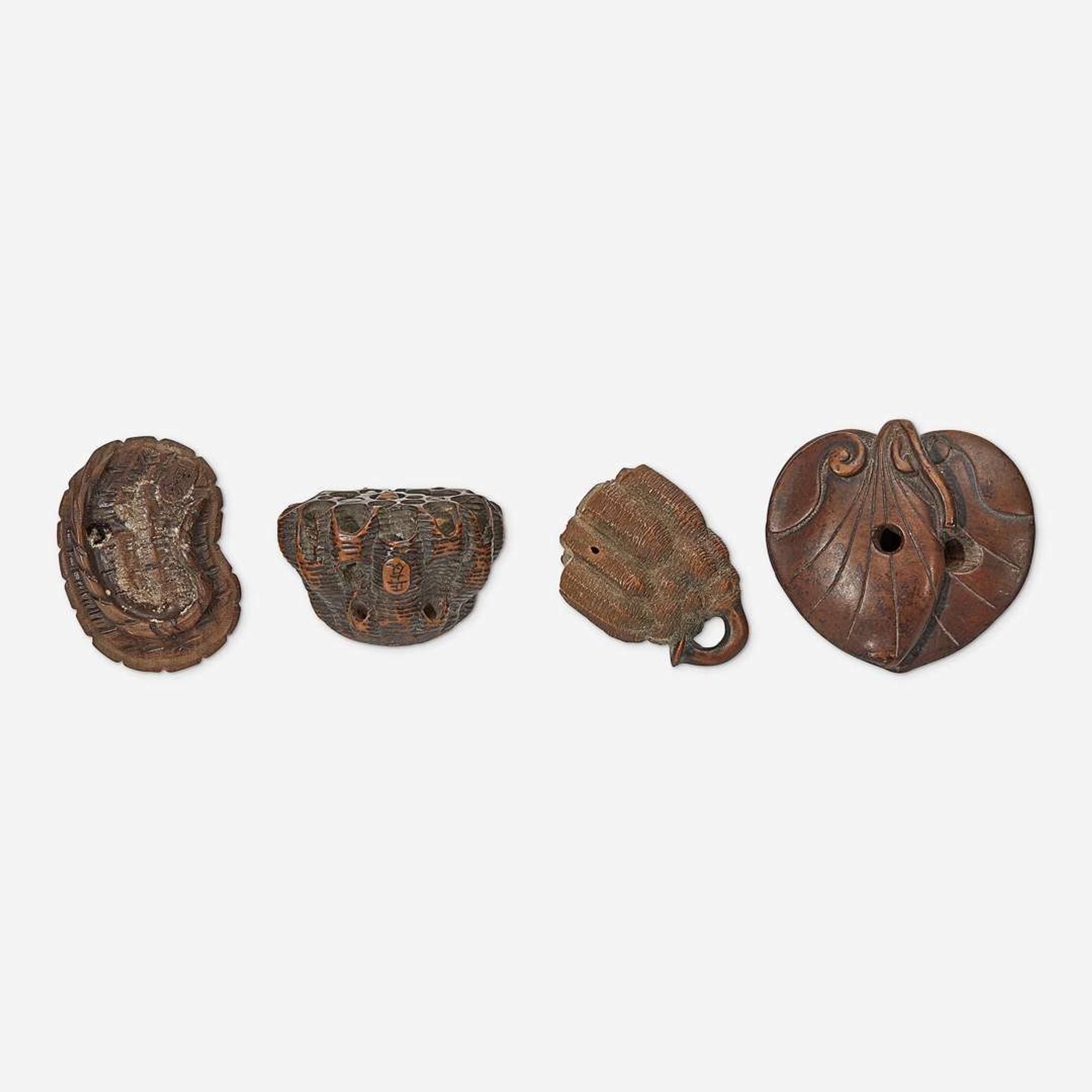 Four assorted Japanese carved wood netsuke