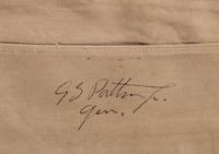 [WORLD WAR II]. PATTON, George S. (1885-1945). Garrison cap signed ("GS Patton Jr. Gen.") in presentation display.
