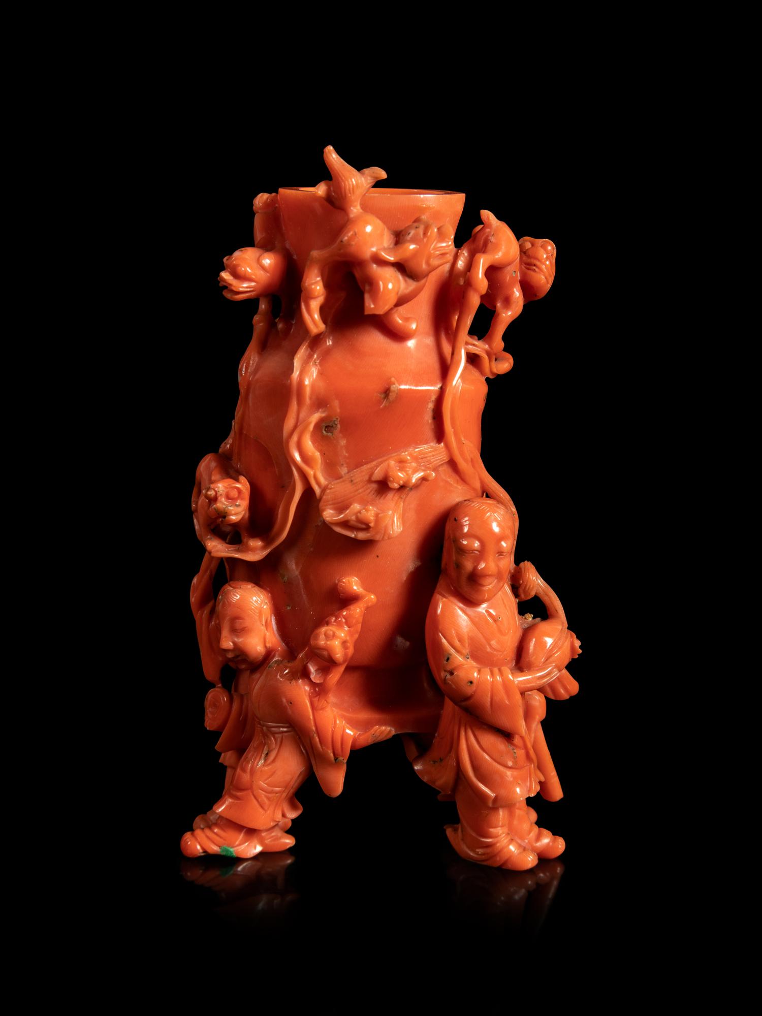 A Carved Red Coral 'Boy' Snuff Bottle