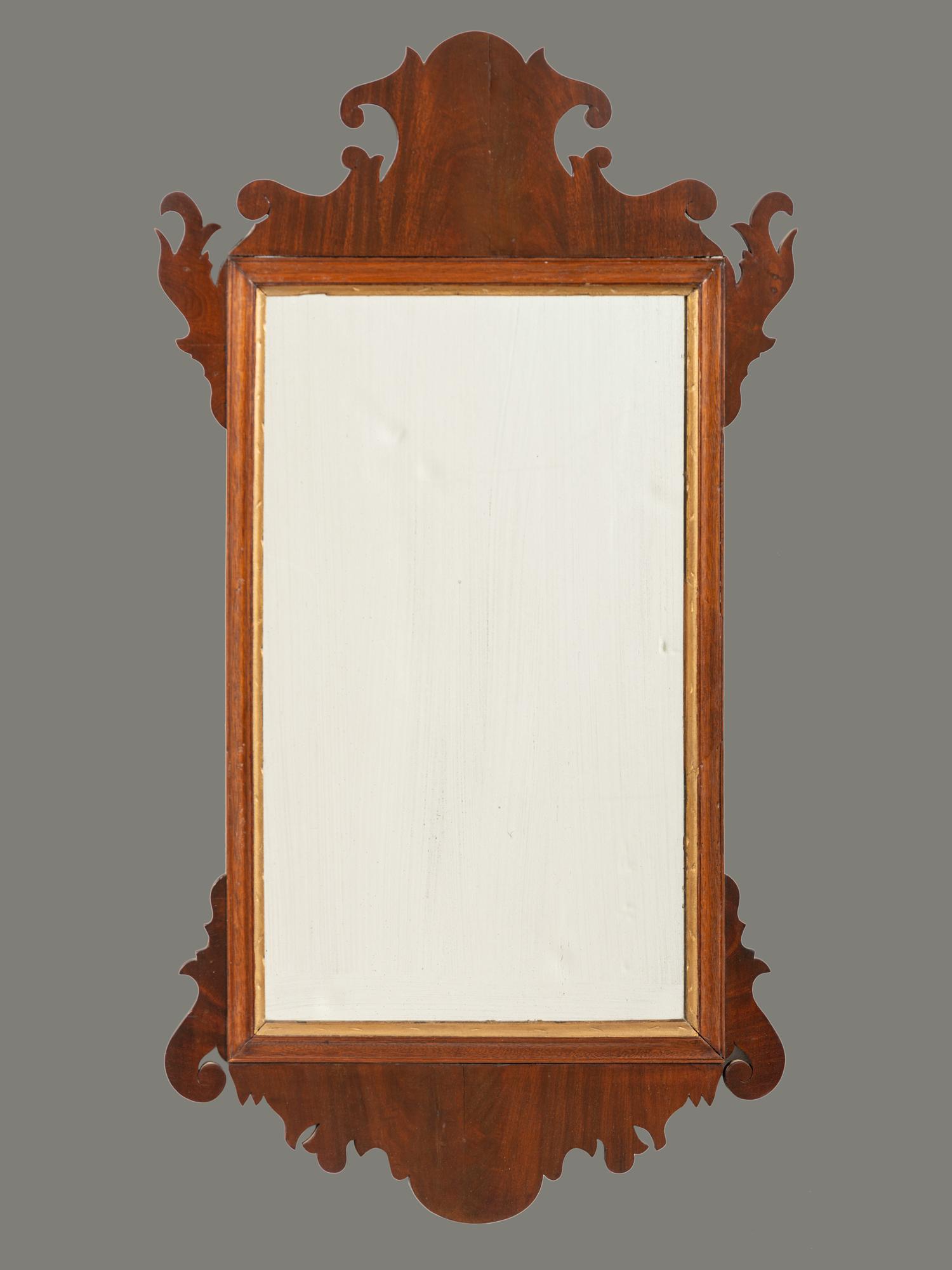 A Chippendale Carved Mahogany Looking Glass