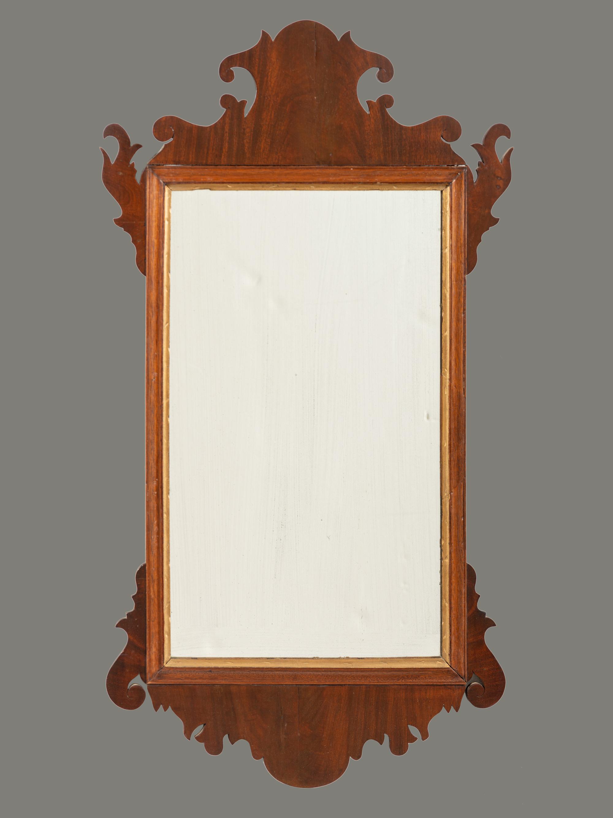 A Chippendale Carved Mahogany Looking Glass
