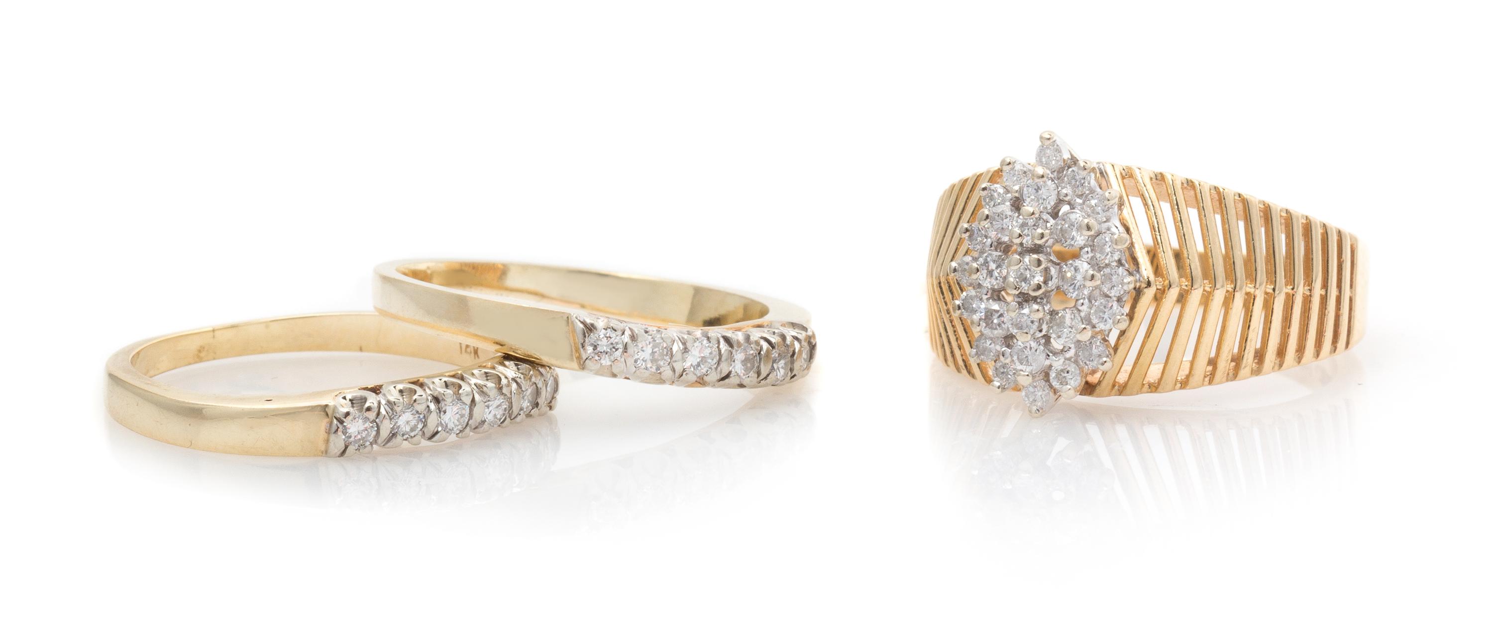 A Collection of 14 Karat Yellow Gold and Diamond Rings, 8.70 dwts.