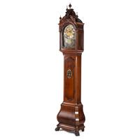 A Dutch Walnut and Gilt Metal Mounted Tall Case Clock