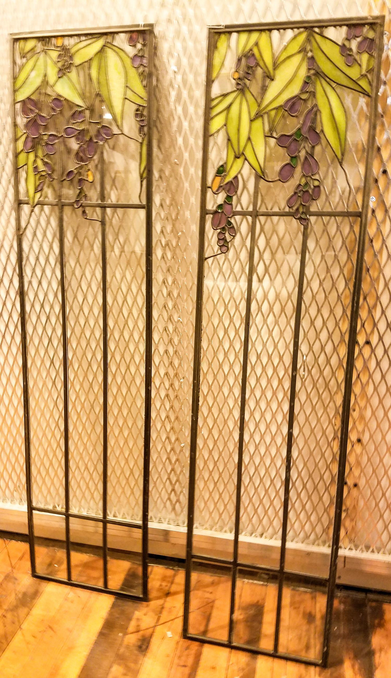 A Pair of Stained Glass Windows. Height 48 x width 12 inches.