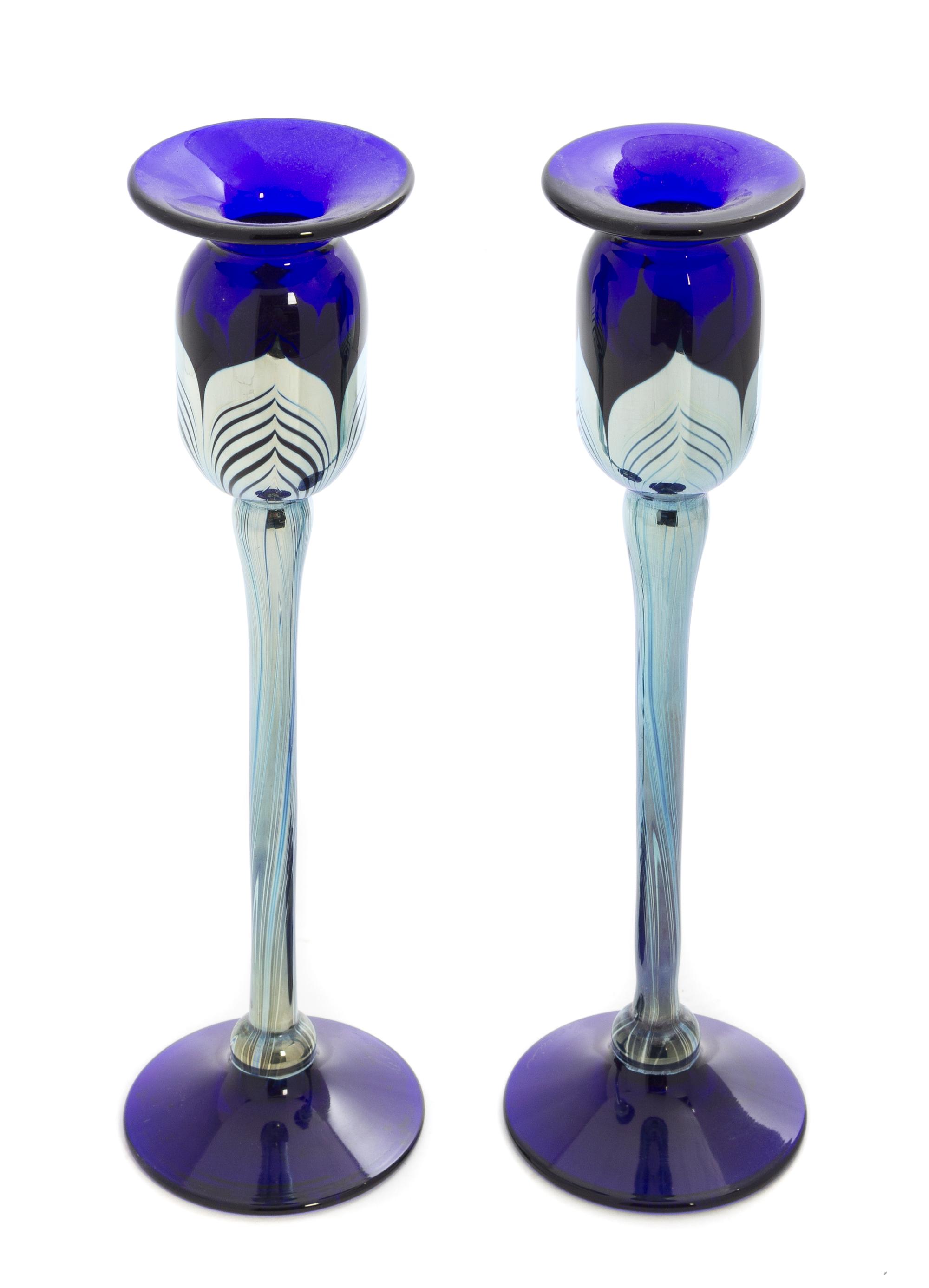 A Pair of Glass Candlesticks Height 10 3/8 inches.