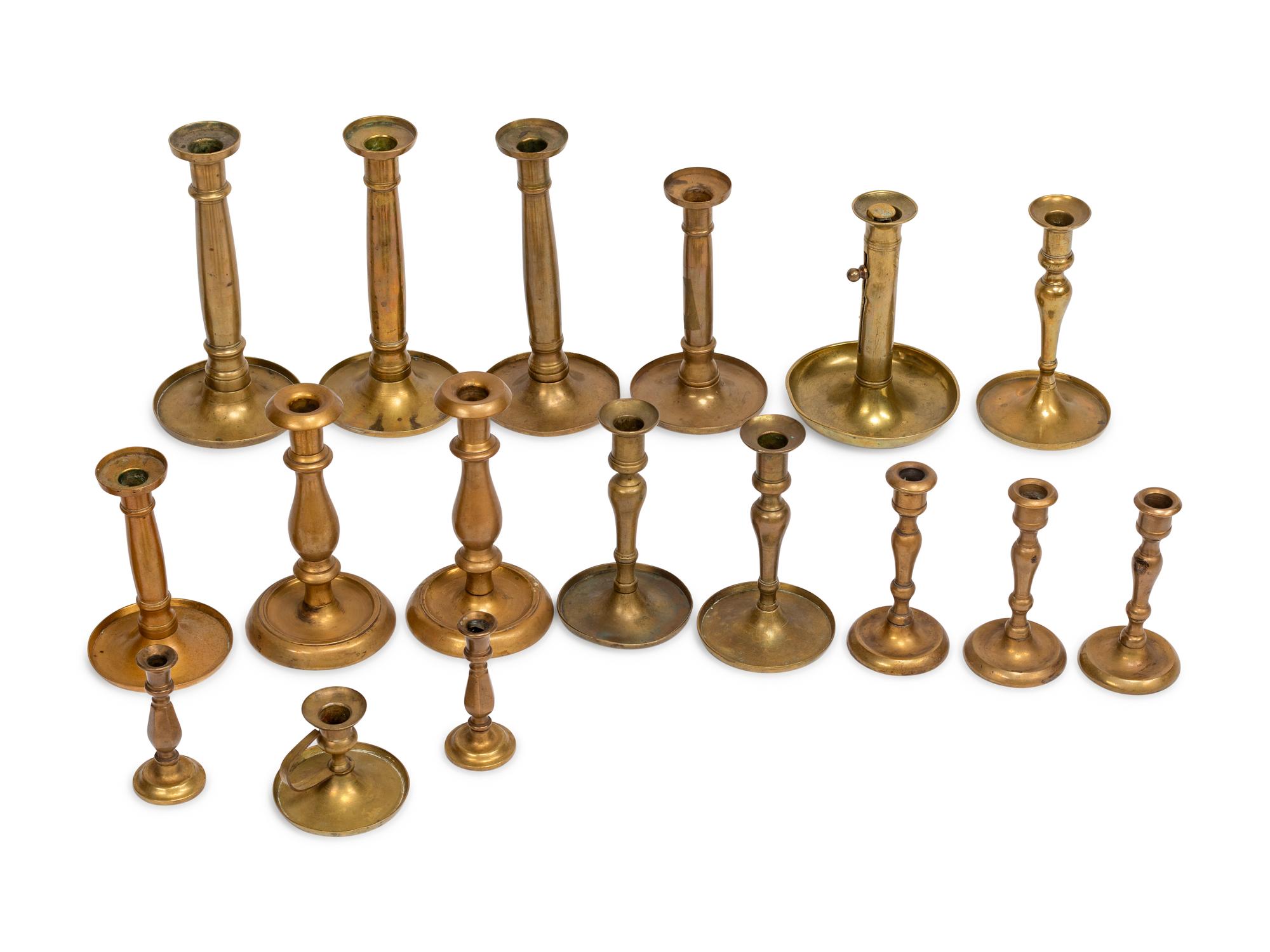 Twenty-Four English Brass Candlesticks