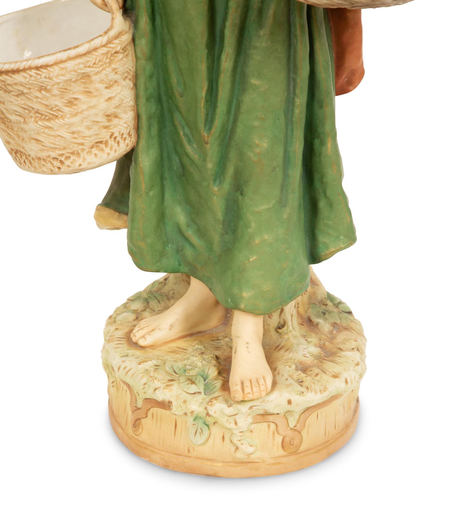 A Pair of Large Royal Dux Porcelain Water Carriers