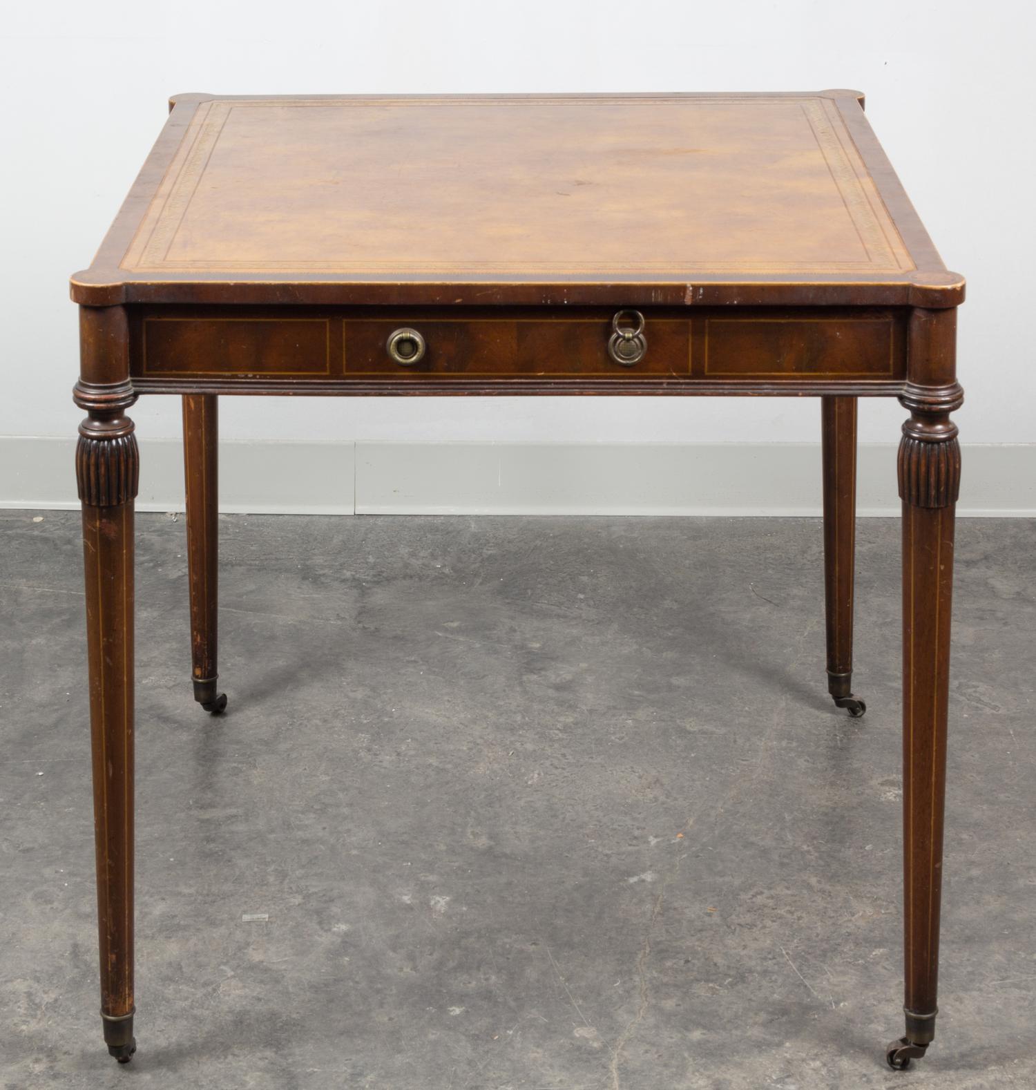 A Sheraton Style Mahogany Side Table Height 28 3/4 x width 30 1/2 x depth 30 1/2 inches. — 20TH CENTURY