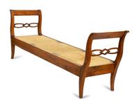 A Northern European Carved Walnut Bench with Rush Seat